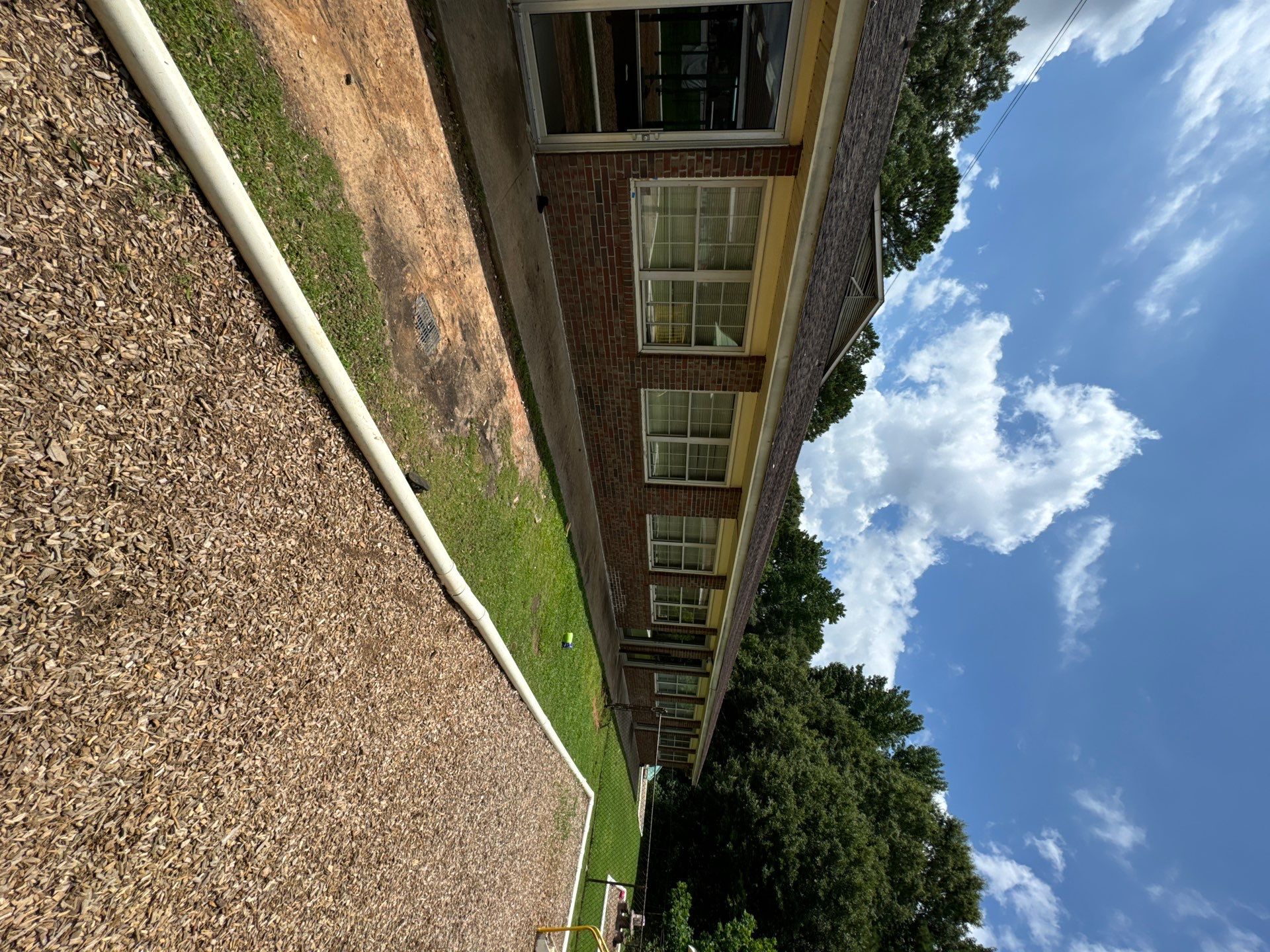 Commercial Exterior Brick and Stucco Painting in Fayetteville by Swift Home Renovations