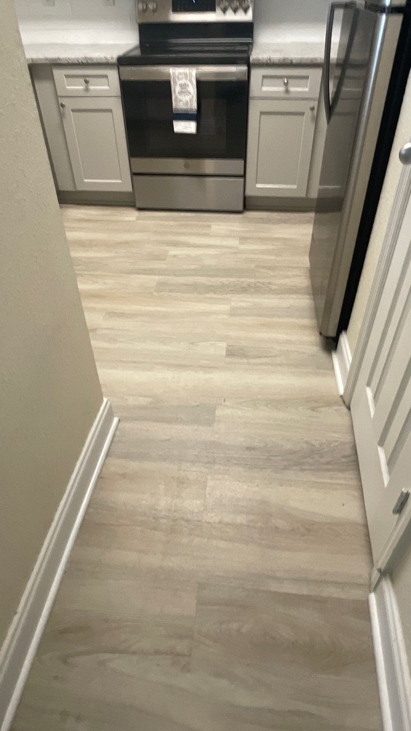 Home Remodel using LVP Flooring and Cabinets by HandyMangum