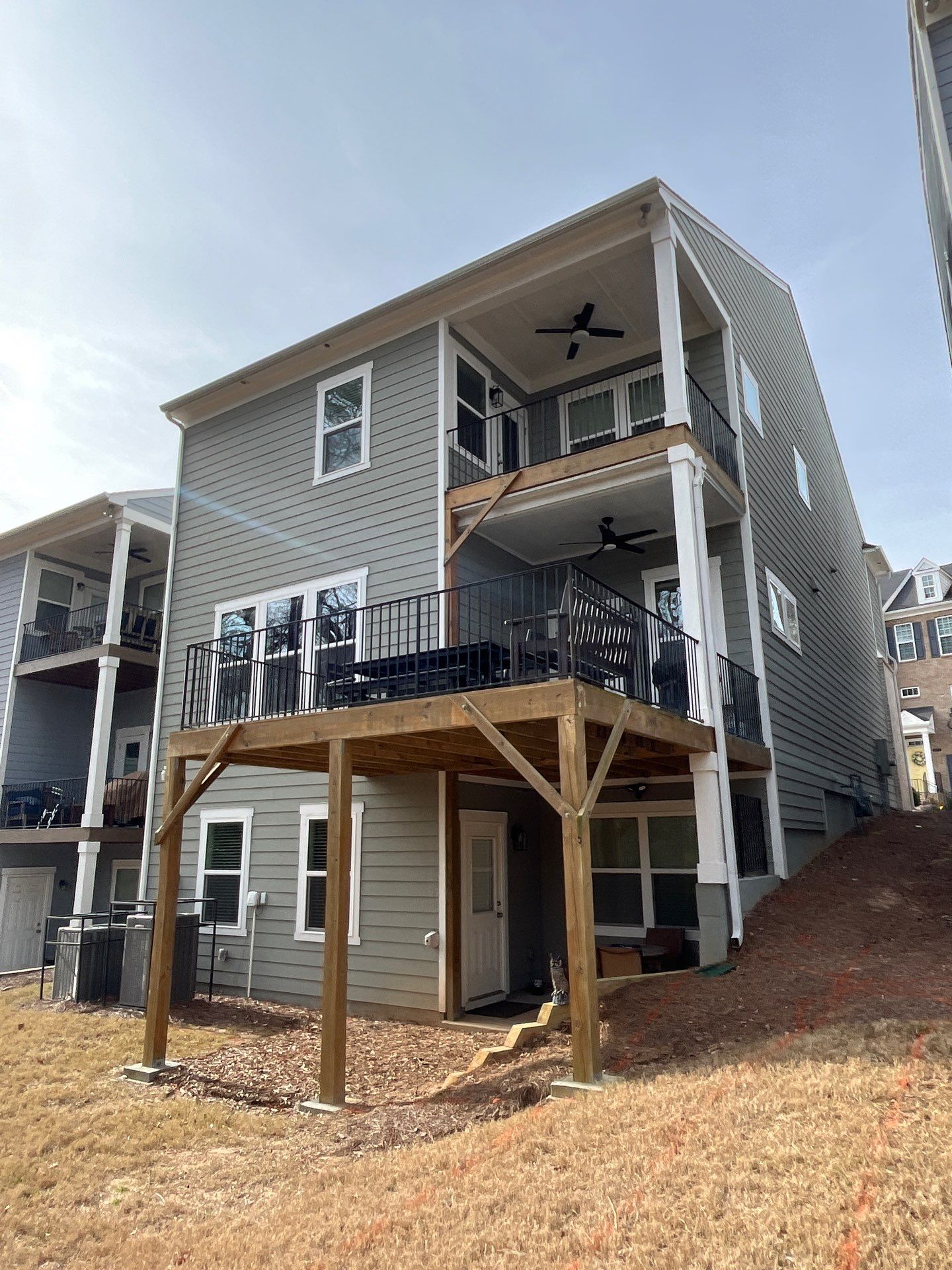 Decatur, GA Multi-Deck Rebuild using Pressure Treated Pine with Trex LED Riser Lights by Nelson Exteriors 