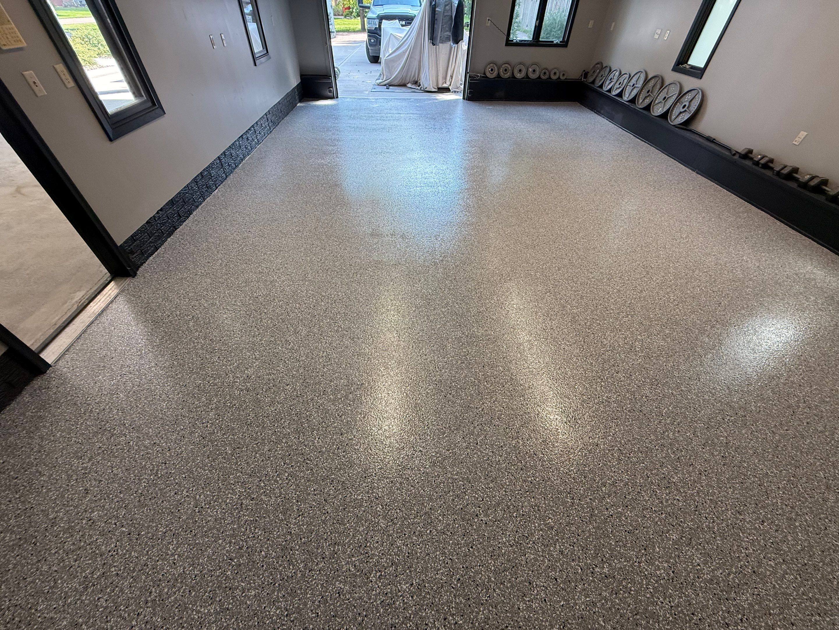 Garage Floor and Textured Pool Deck Coating in Sioux Falls by Select Painting, Coatings & Garage Cabinets