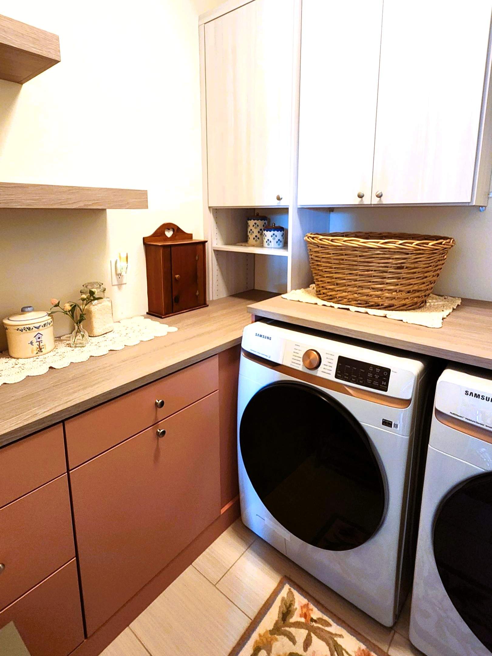 Laundry Room designed to match closets by Concept 32, Inc.