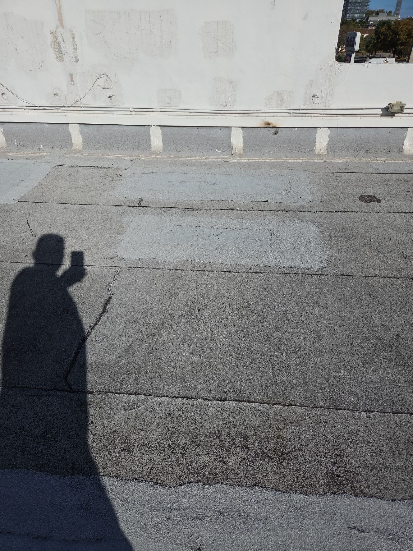 Commercial Flat Roof Restoration Using Silicone Coating in Hallandale Beach by Aastro Roofing
