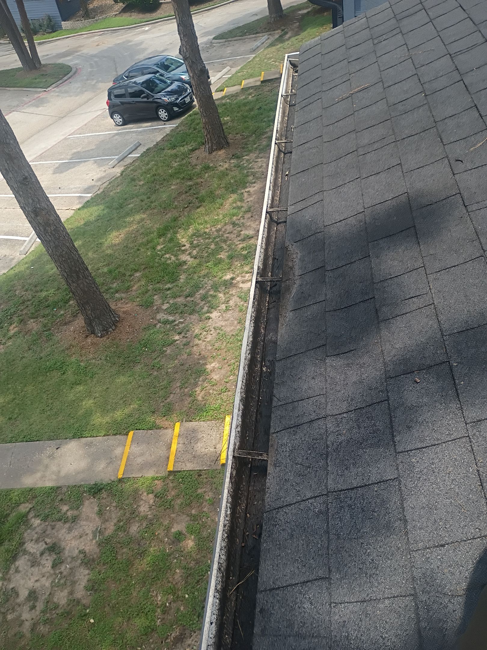 Commercial gutter cleaning College Station & Bryan, TX after photo with clean gutters