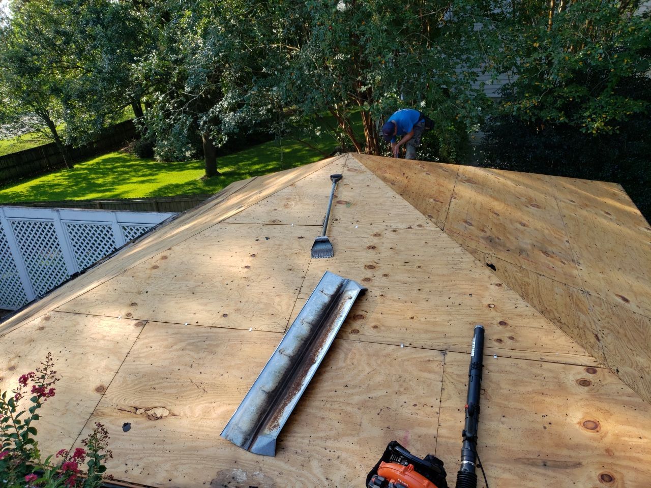 Residential Roofing Installation using Roof Replacement by American Roofing & Construction LLC