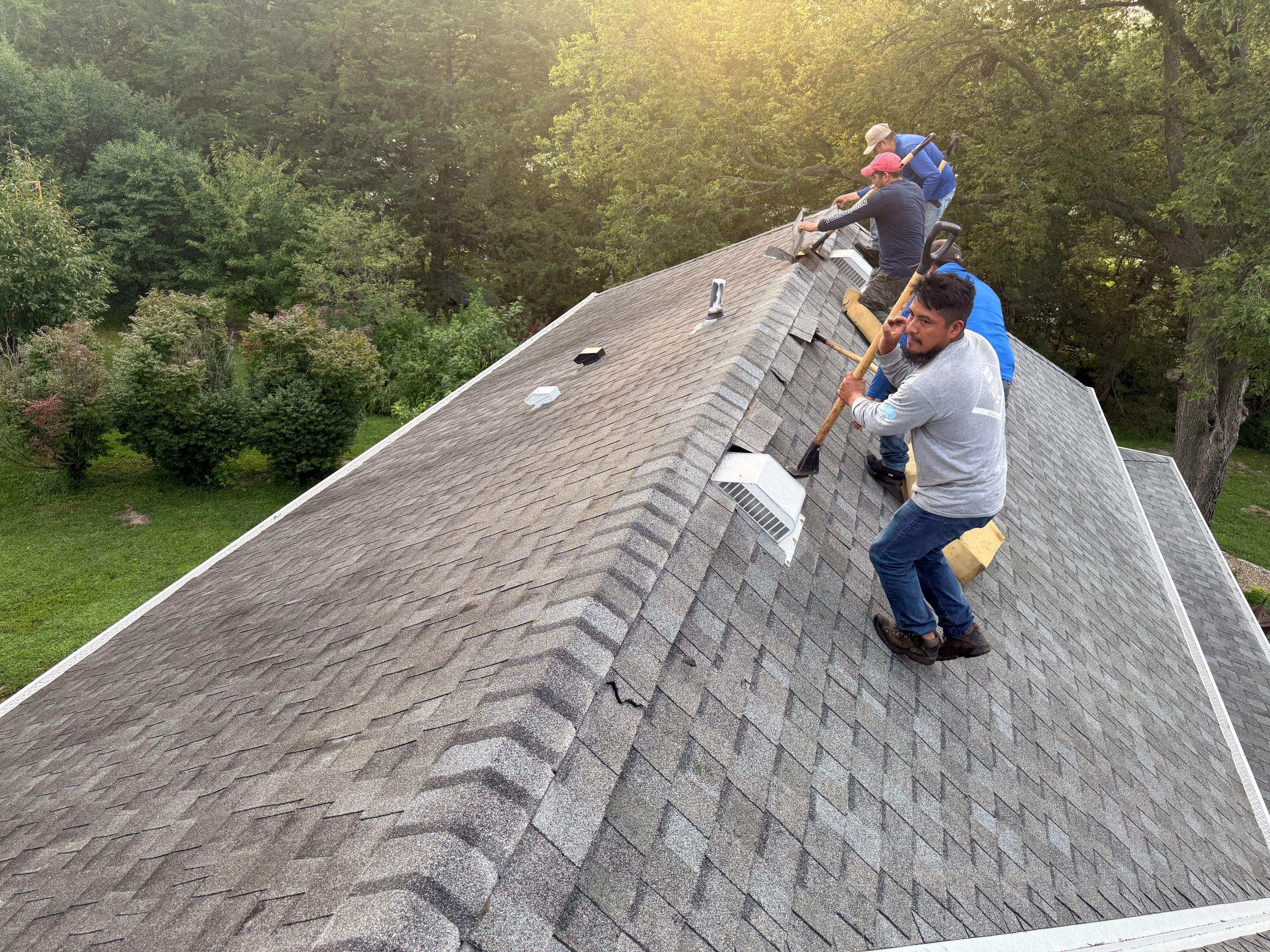 Asphalt Shingle and EPDM Membrane Roof Installation in Mineola by Star Home