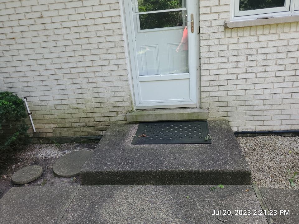 Aggregate concrete cleaning and sealing using Surebond SB-9000 by Northern Power Washing LLC.
