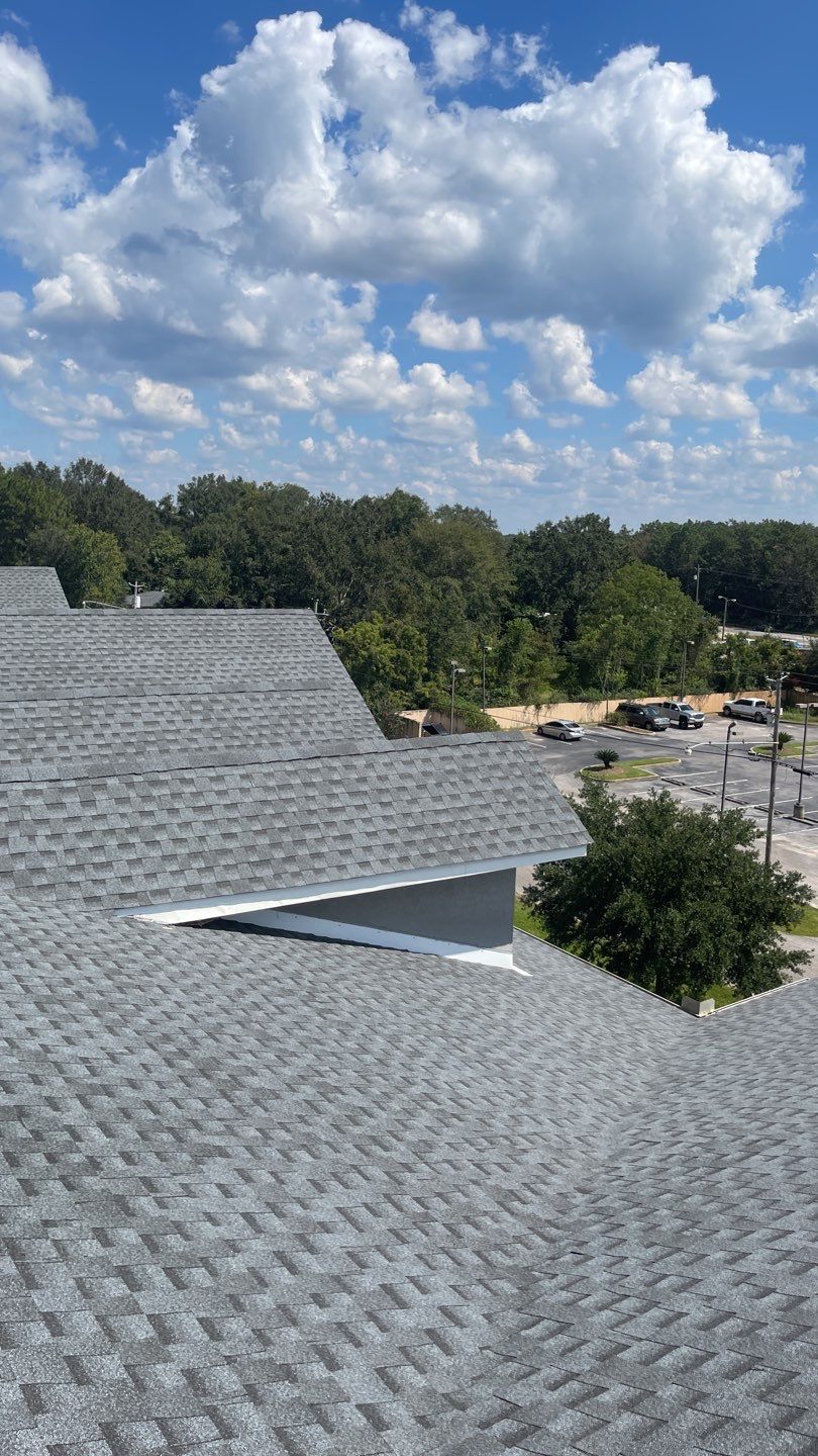 Commercial Roofing Installation using Roof Replacement by American Roofing & Construction LLC