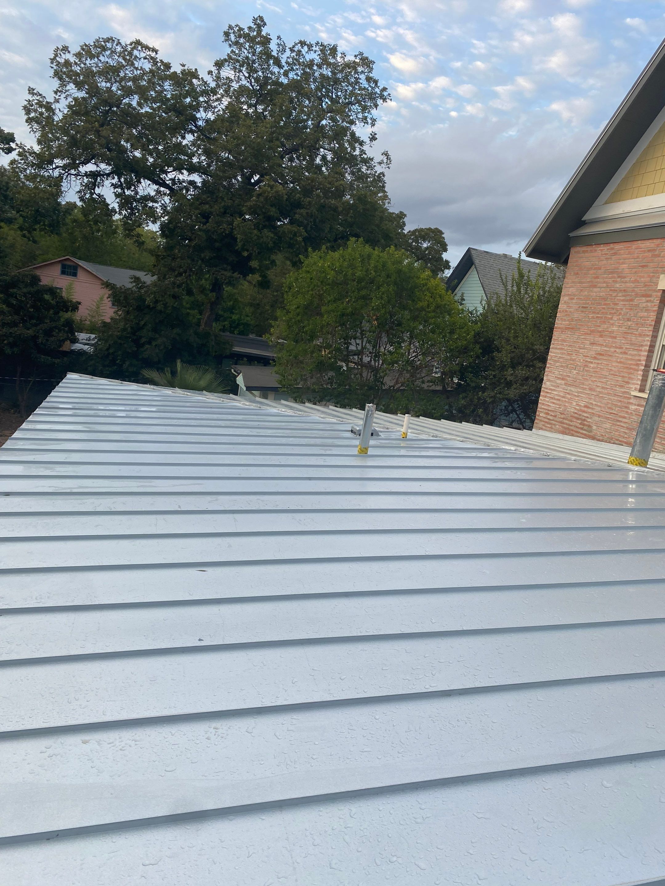 Residential Metal Roof Installation using McElroy Metal by Premier Roofing and Contracting