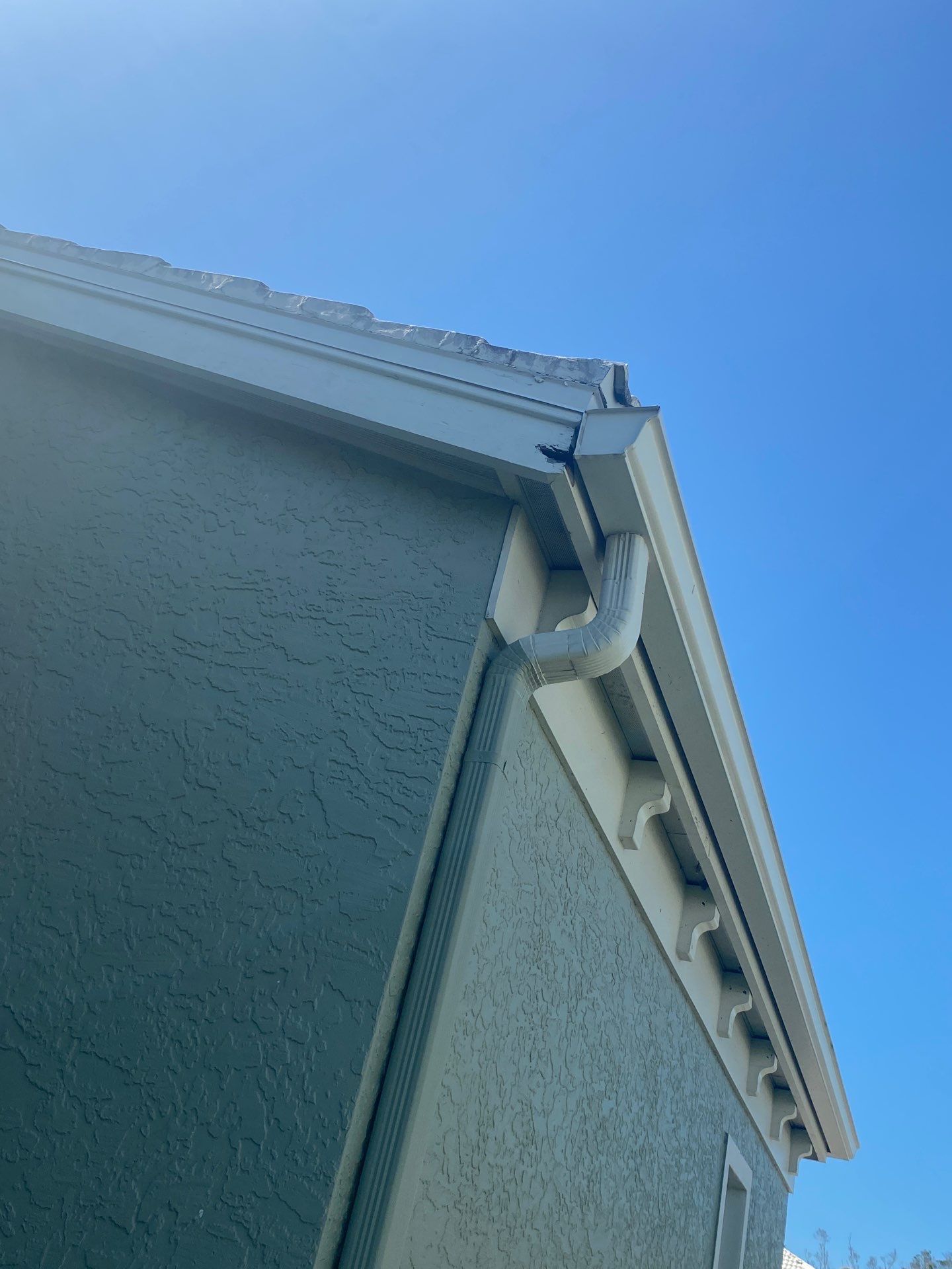 Splash Guard Gutters for Coastal Homes in Longboat Key FL by Gutter Professors