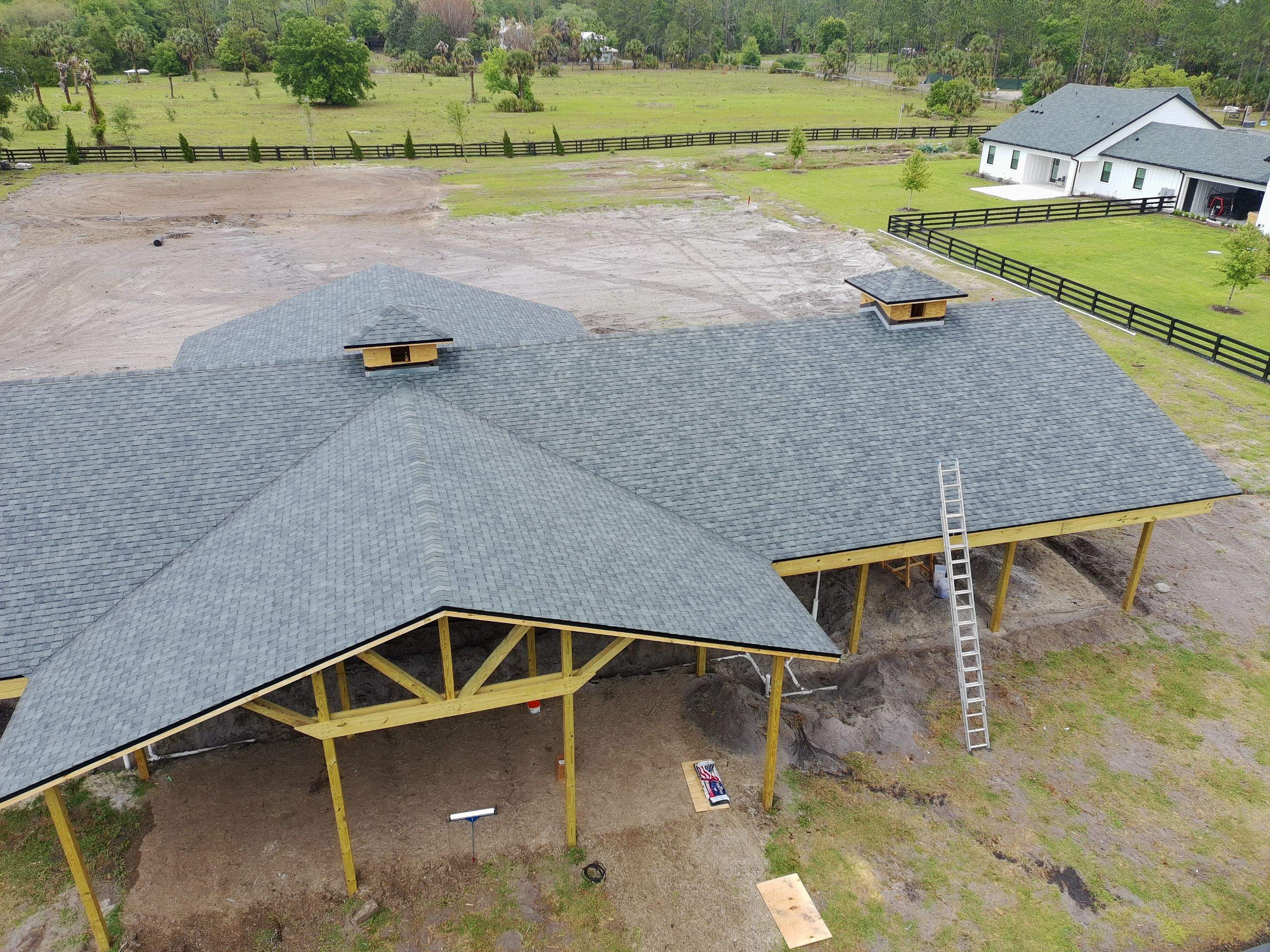 Custom Post-Frame Horse Barn and Shingle Roof Installation in Geneva by Fortified Roofing Solutions Corp.