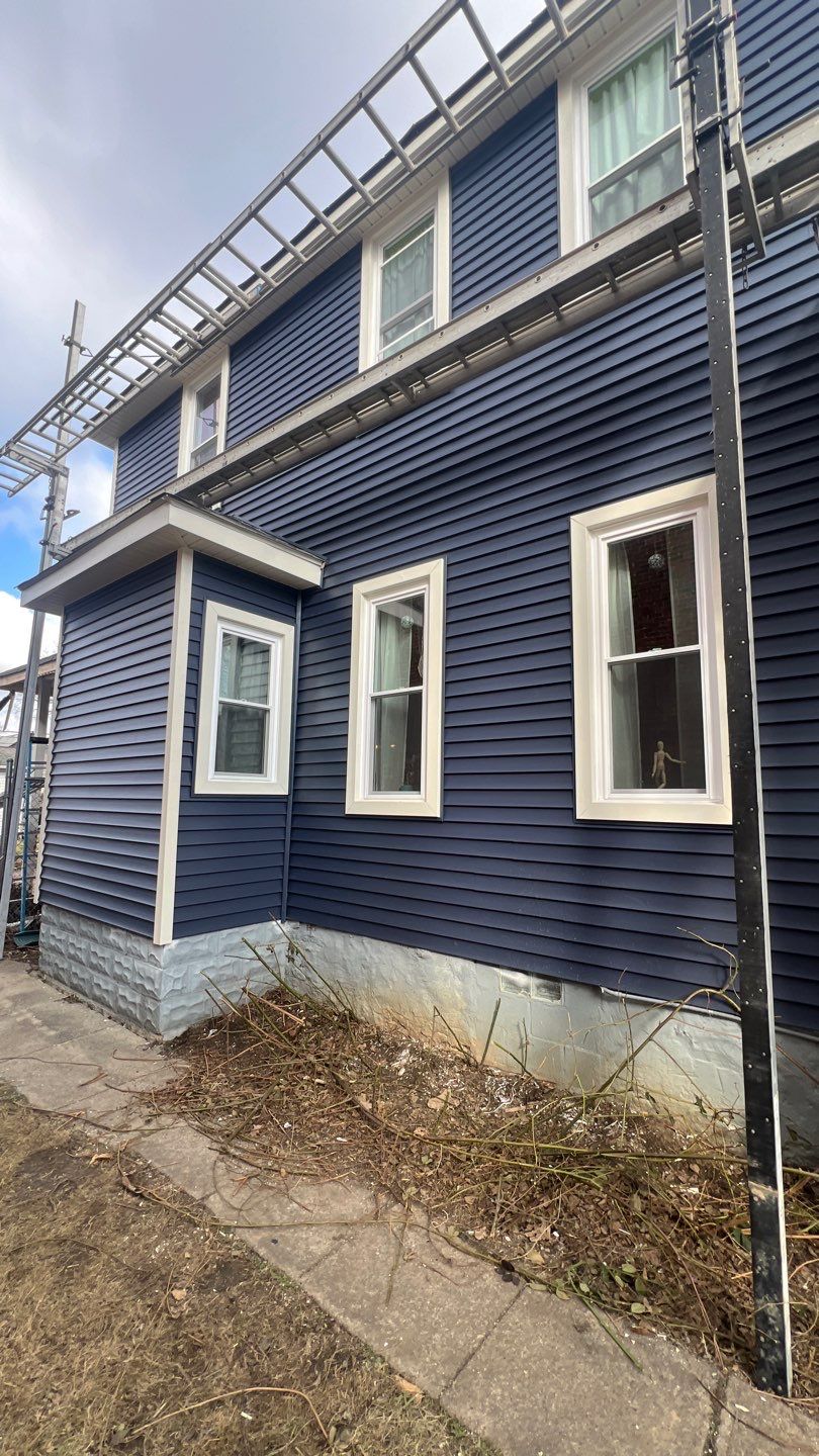 Adding Windows and installing Siding by Know-A-Guy Roofing & Exteriors