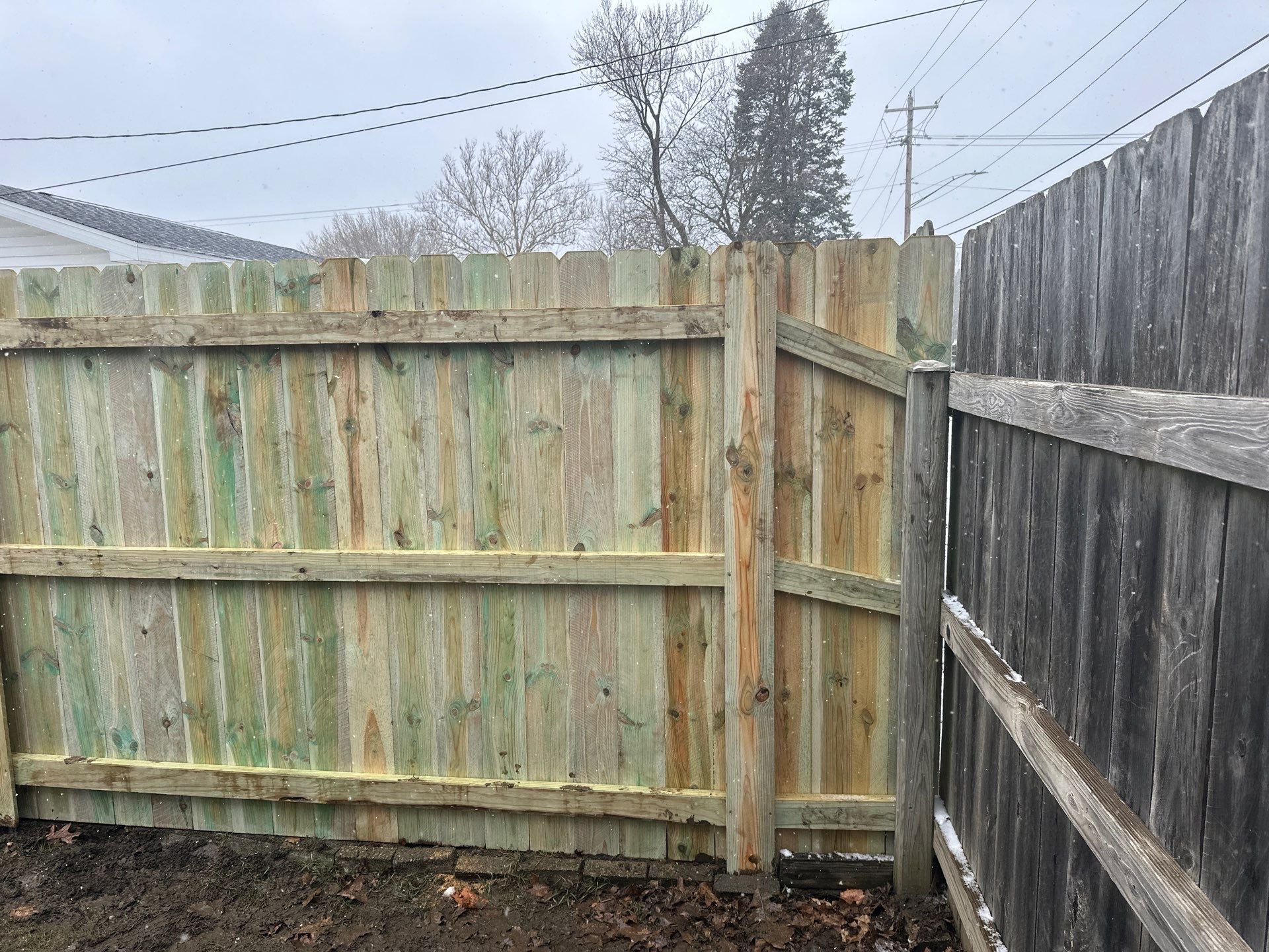 Pressure-Treated Wood Privacy Fence Replacement in Waterloo by Perfect Picket Fence and Stain
