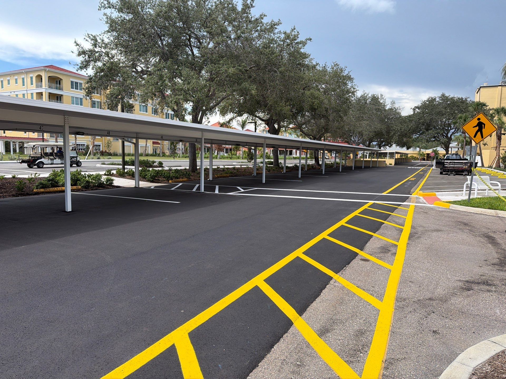 Comprehensive Parking Lot Mill and Overlay with Custom Line Striping in Venice by Everline Coatings & Services - Southwest FL