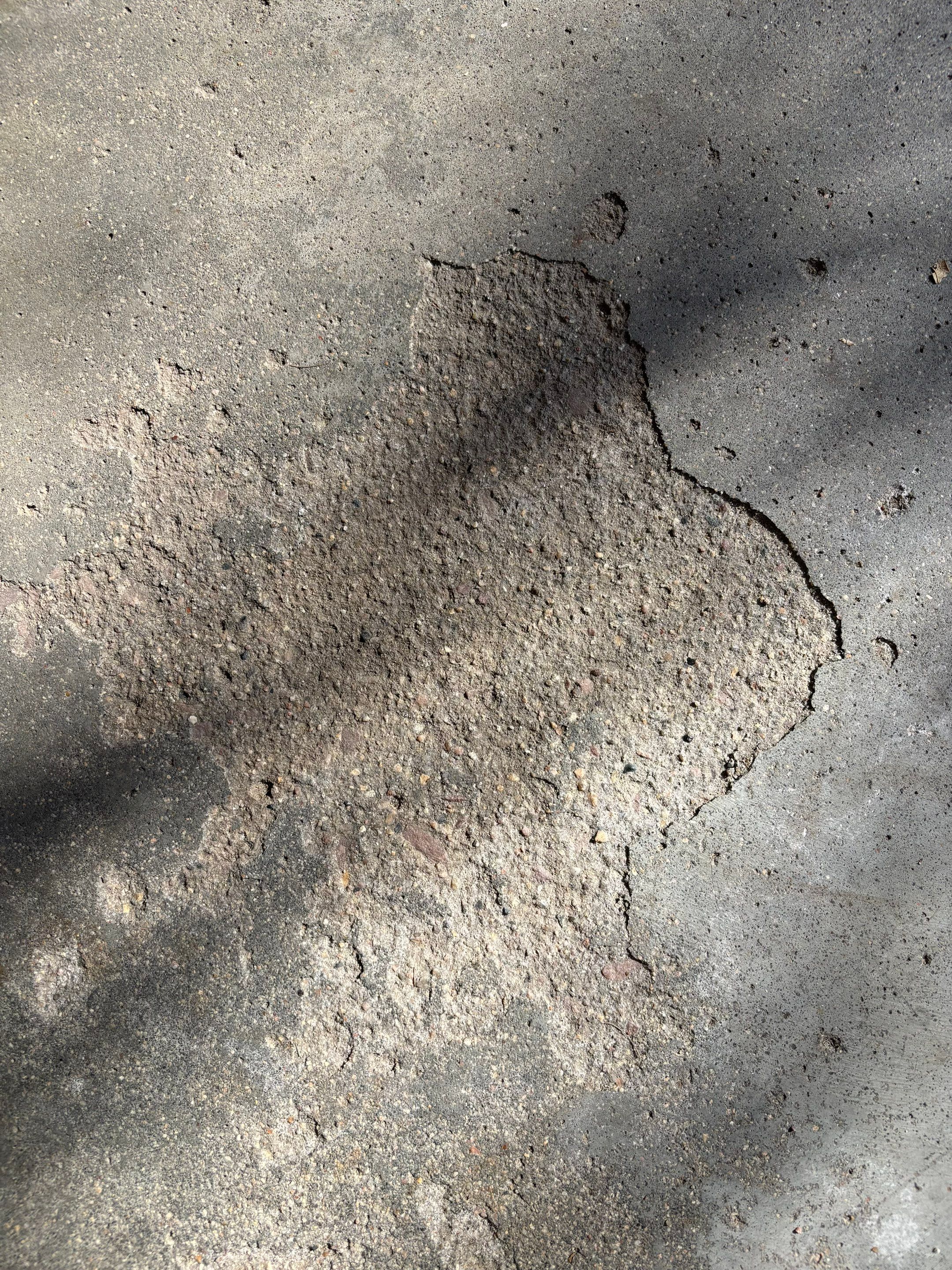 Yankton Garage Floor Restoration with Gray Speckled Epoxy Coating by Select Painting, Coatings & Garage Cabinets