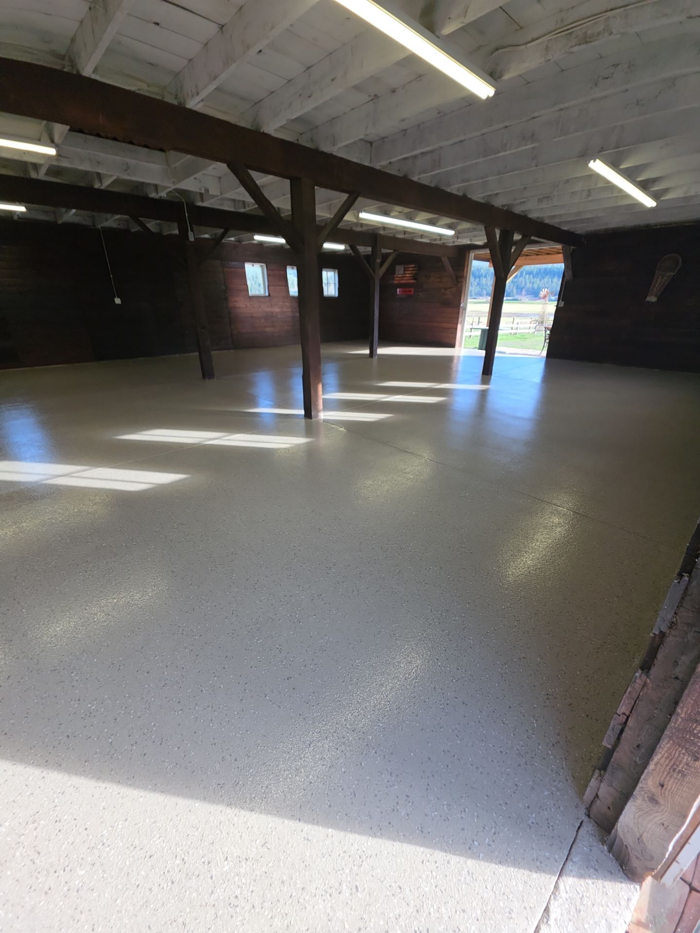 Santa Fe Hybrid Concrete Floor Coating for Bonners Ferry Barn by Croc Coatings, LLC