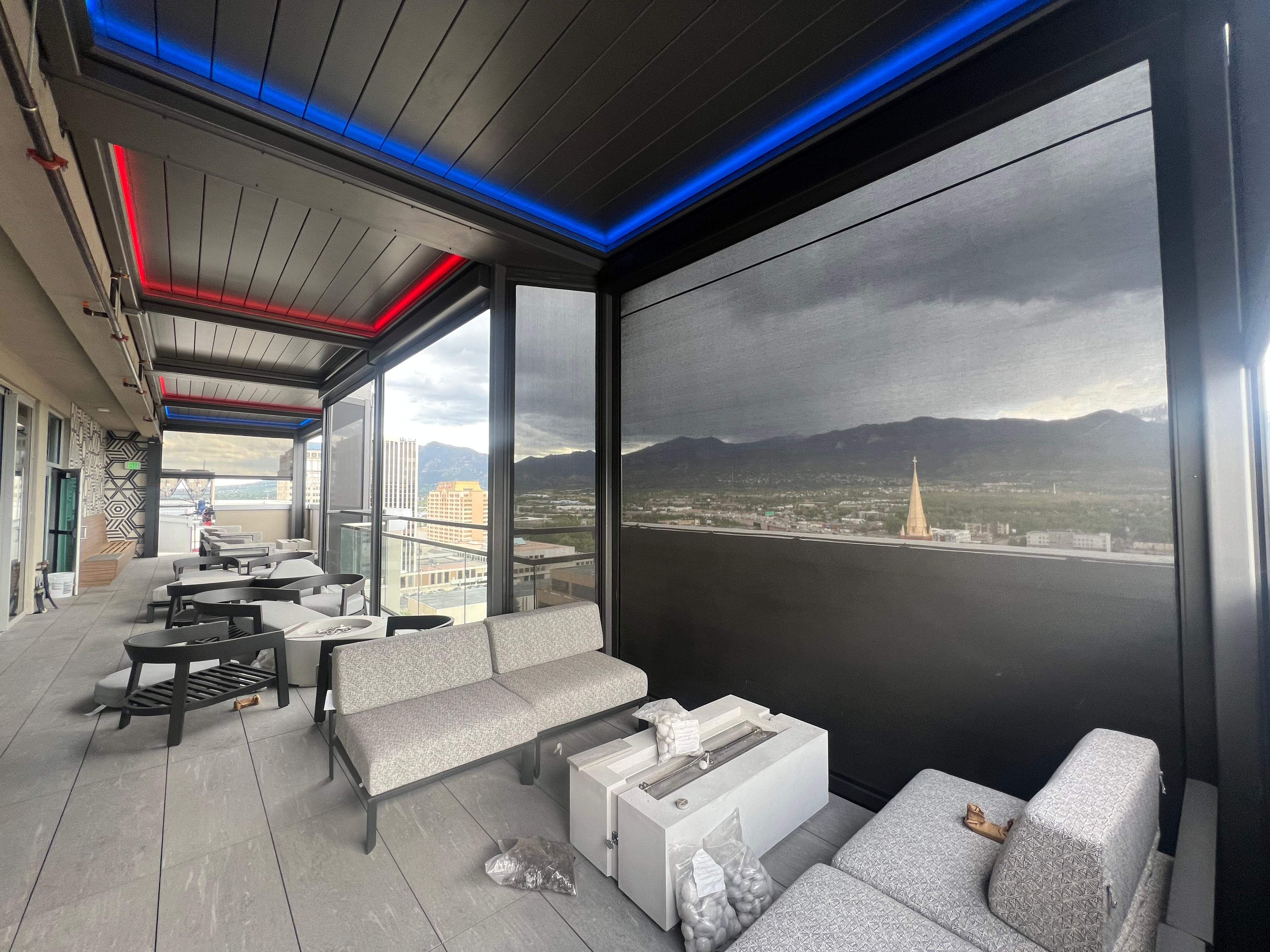 Hotel Rooftop Motorized Pergola & Screens by Outdoor Solutions Colorado