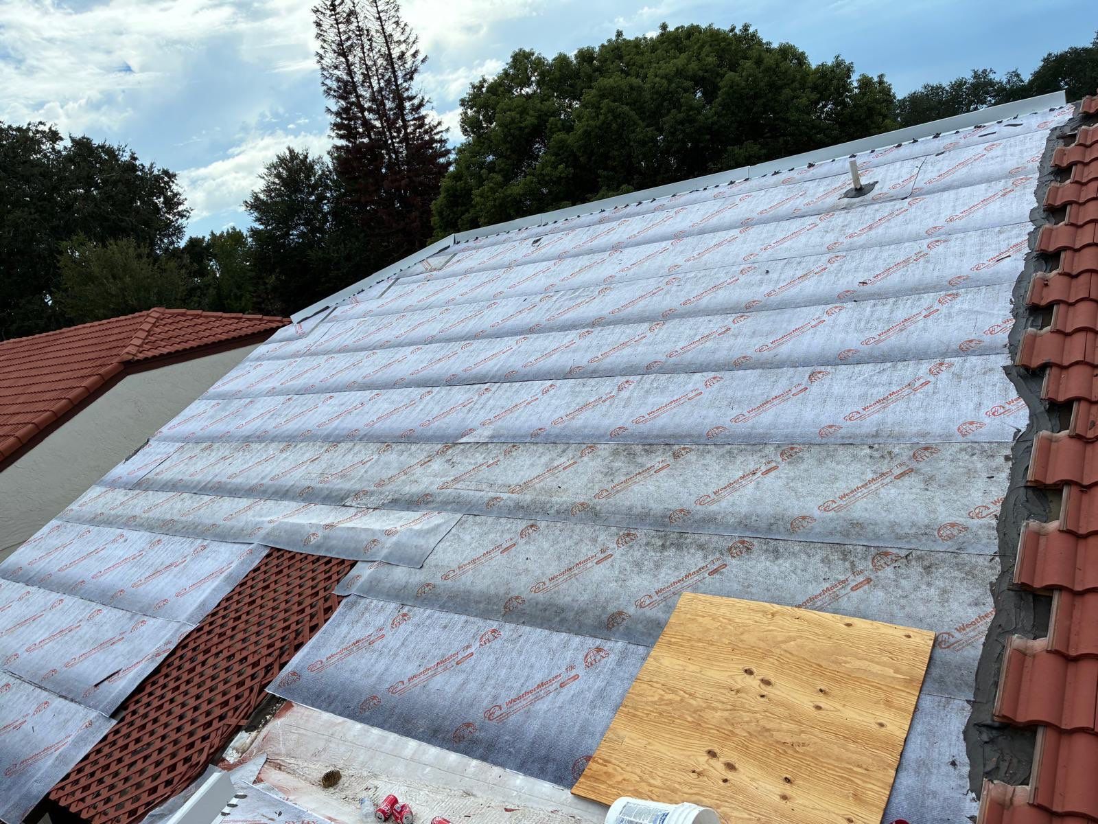Residential Tile Roof Replacement and Gutter Installation in Winter Park by Pinnacle Roofing Group