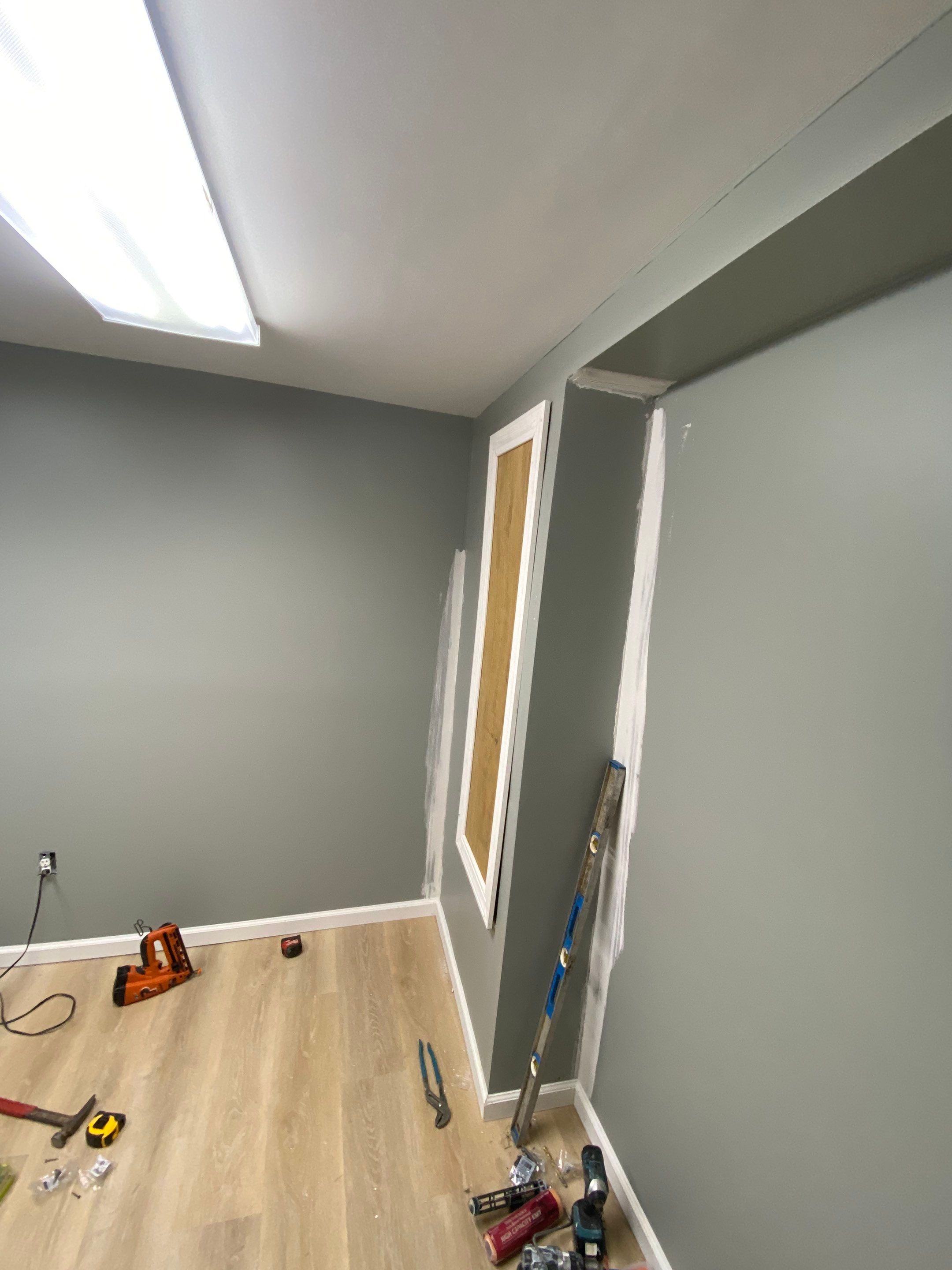 Laundry Room Redmodel using Lifeproof Luxury Vinyl Plank Flooring by The Smet Companies, LLC