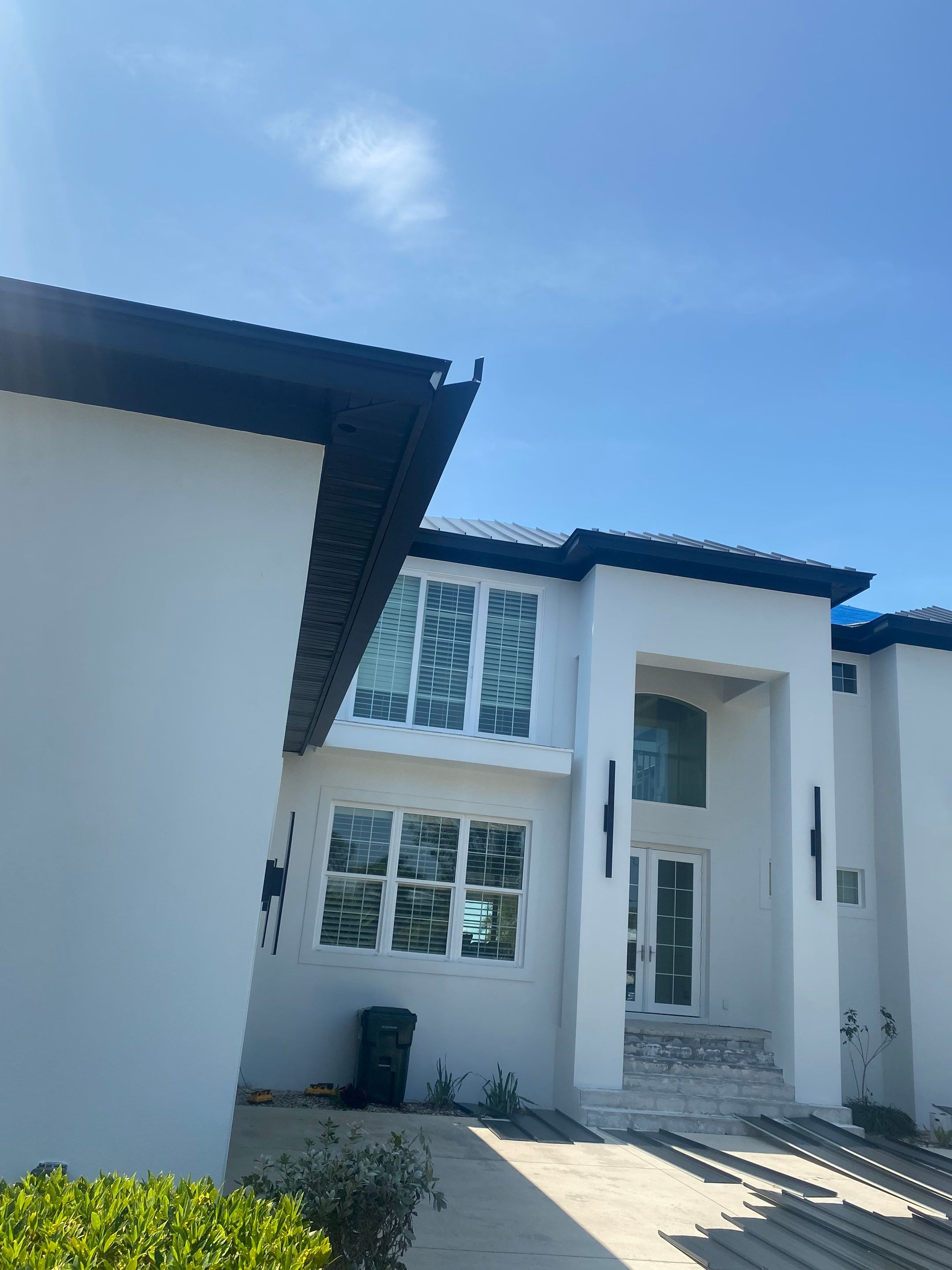 Soffit and Fascia Installation and black seamless gutters in Sarasota FL by Gutter Professors