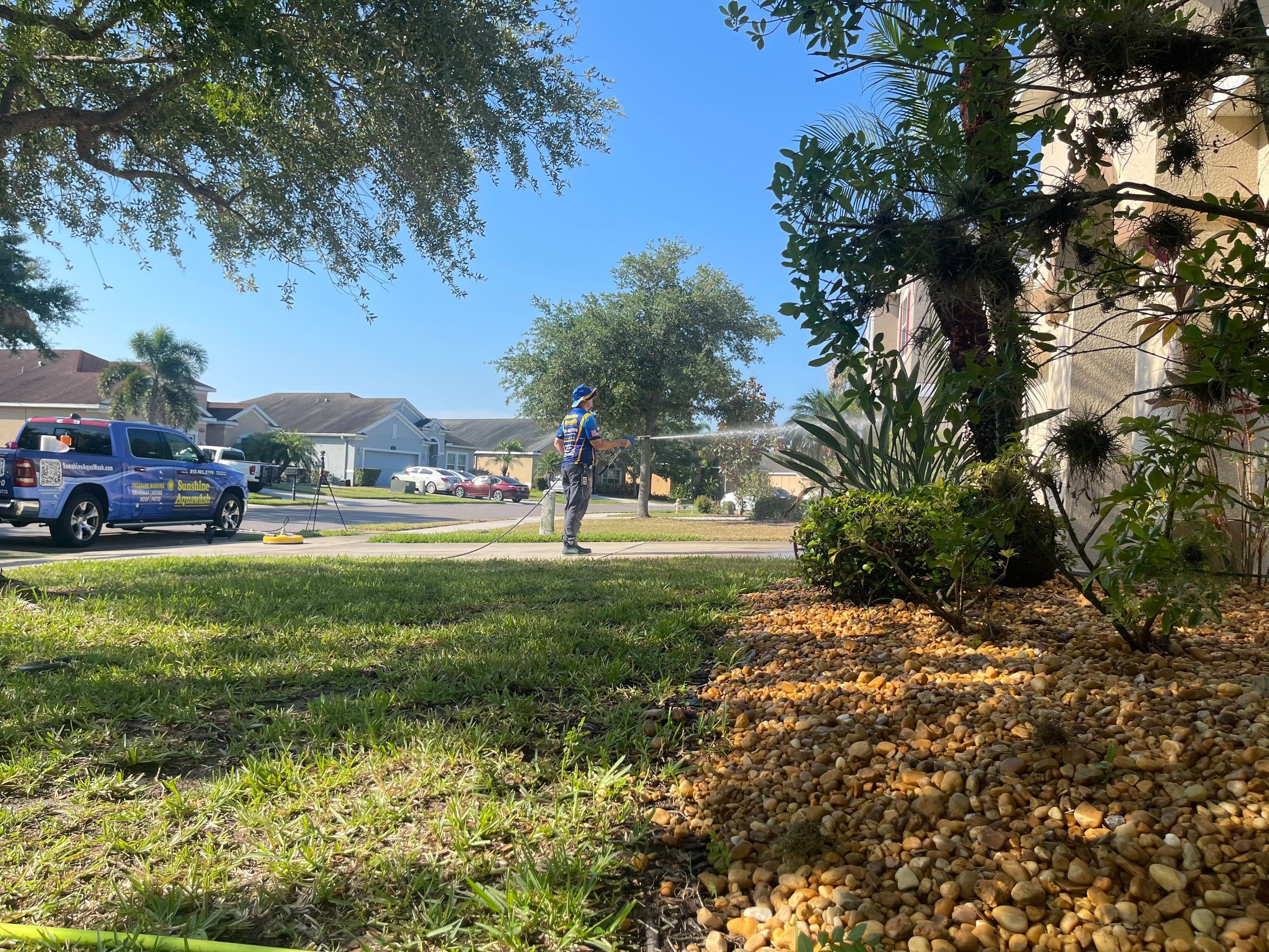 Asphalt Shingle Roof Soft Wash Cleaning & Concrete Pressure Washing in CopperStone Community, Parrish, FL by Sunshine AquaWash