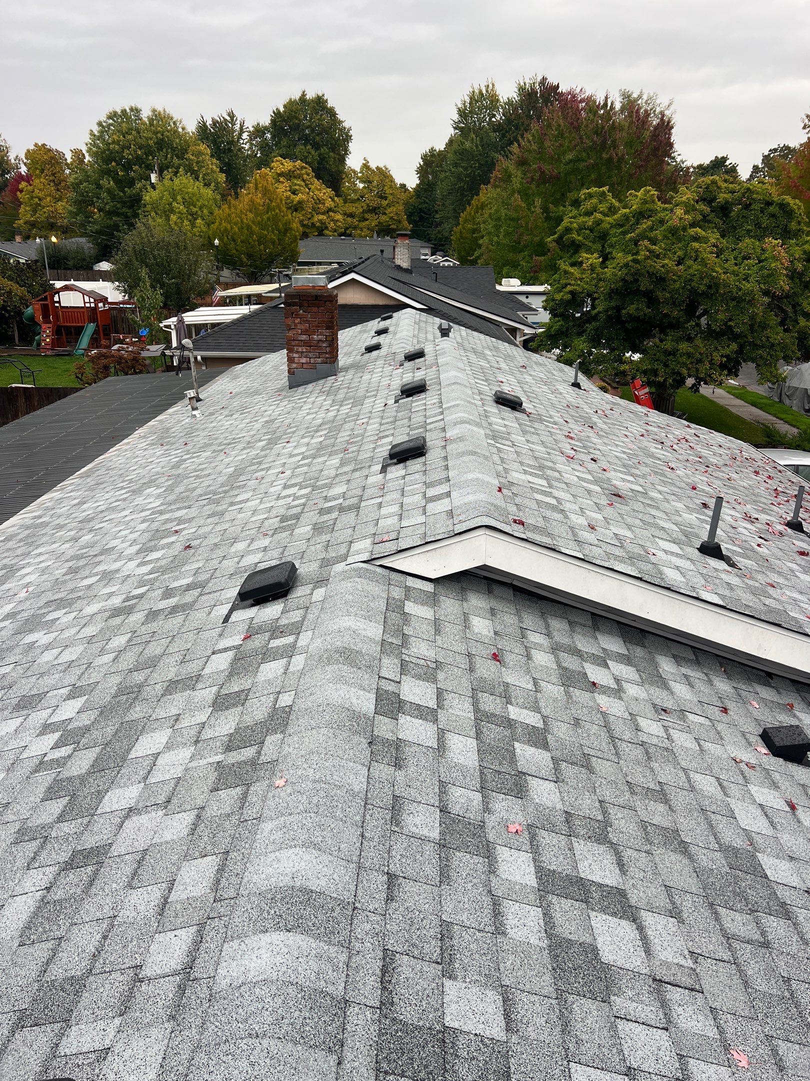 Residential Roofing Installation using IKO Dynasty (Color: Frostone Grey) by Orezona Building & Roofing Company, Inc.