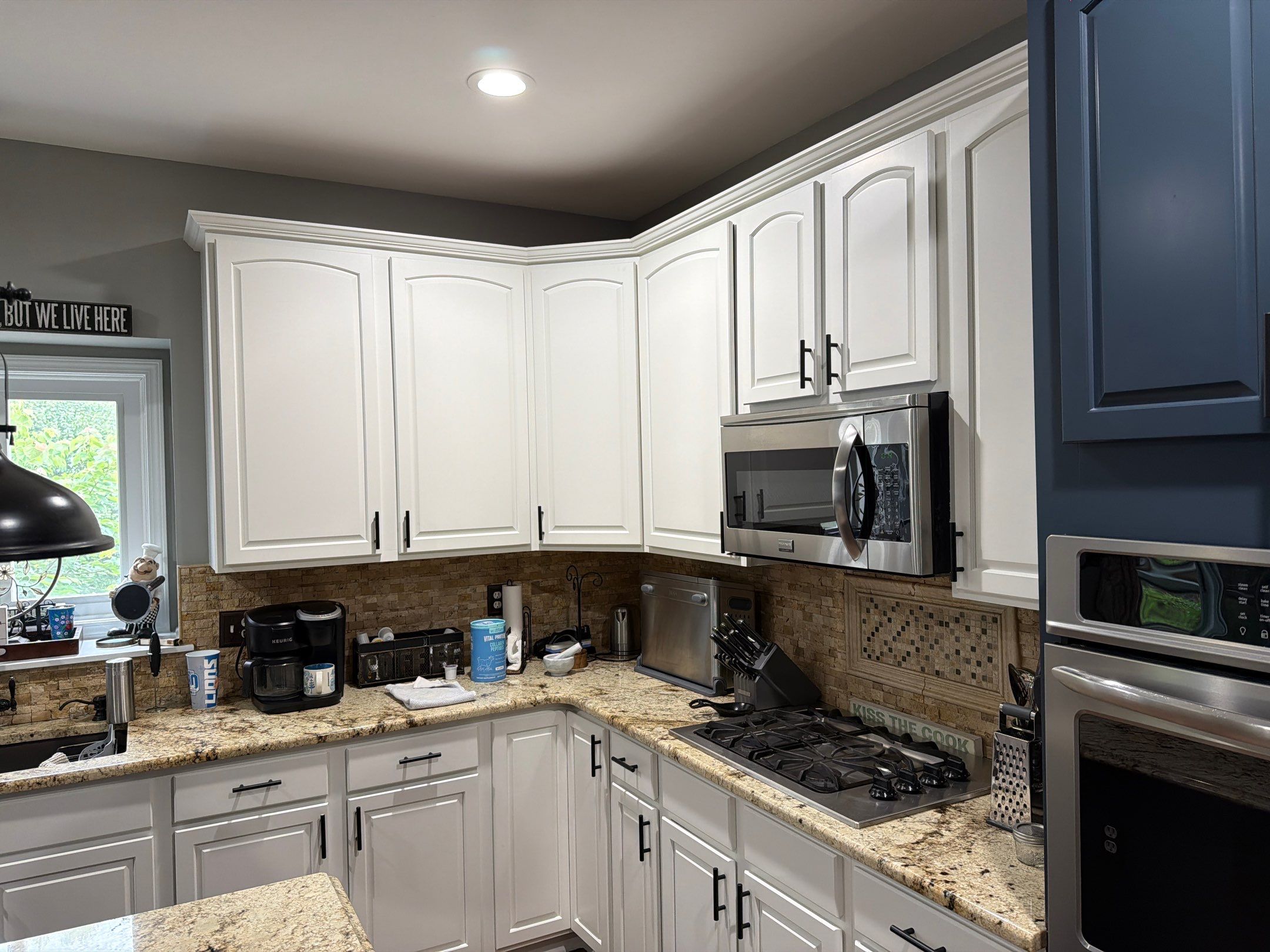 Kitchen Cabinet Refinishing by Top Shelf Painter