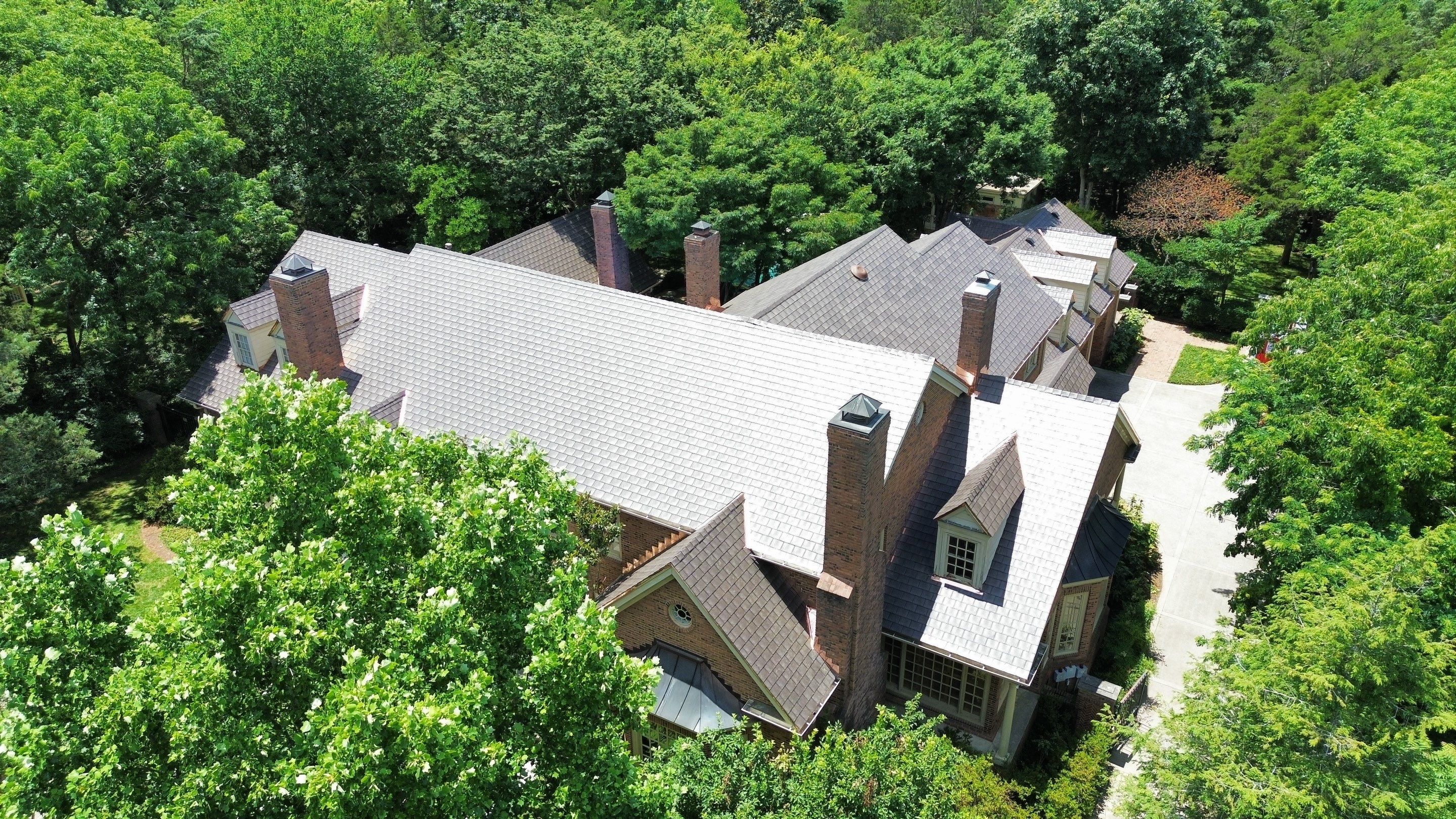 Residential Roofing Installation Using Enviroshake Synthetic Slate by Undersun Roofing 
