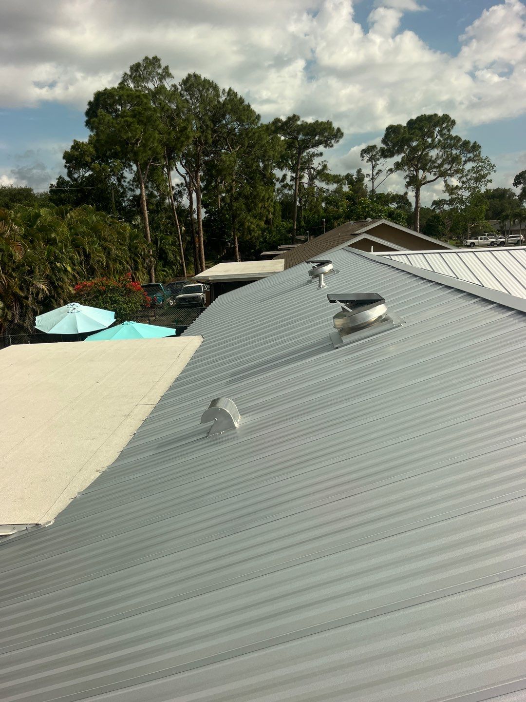 Residential Roofing Installation using Durabull Standing Seam System by Durabilis Roofing INC