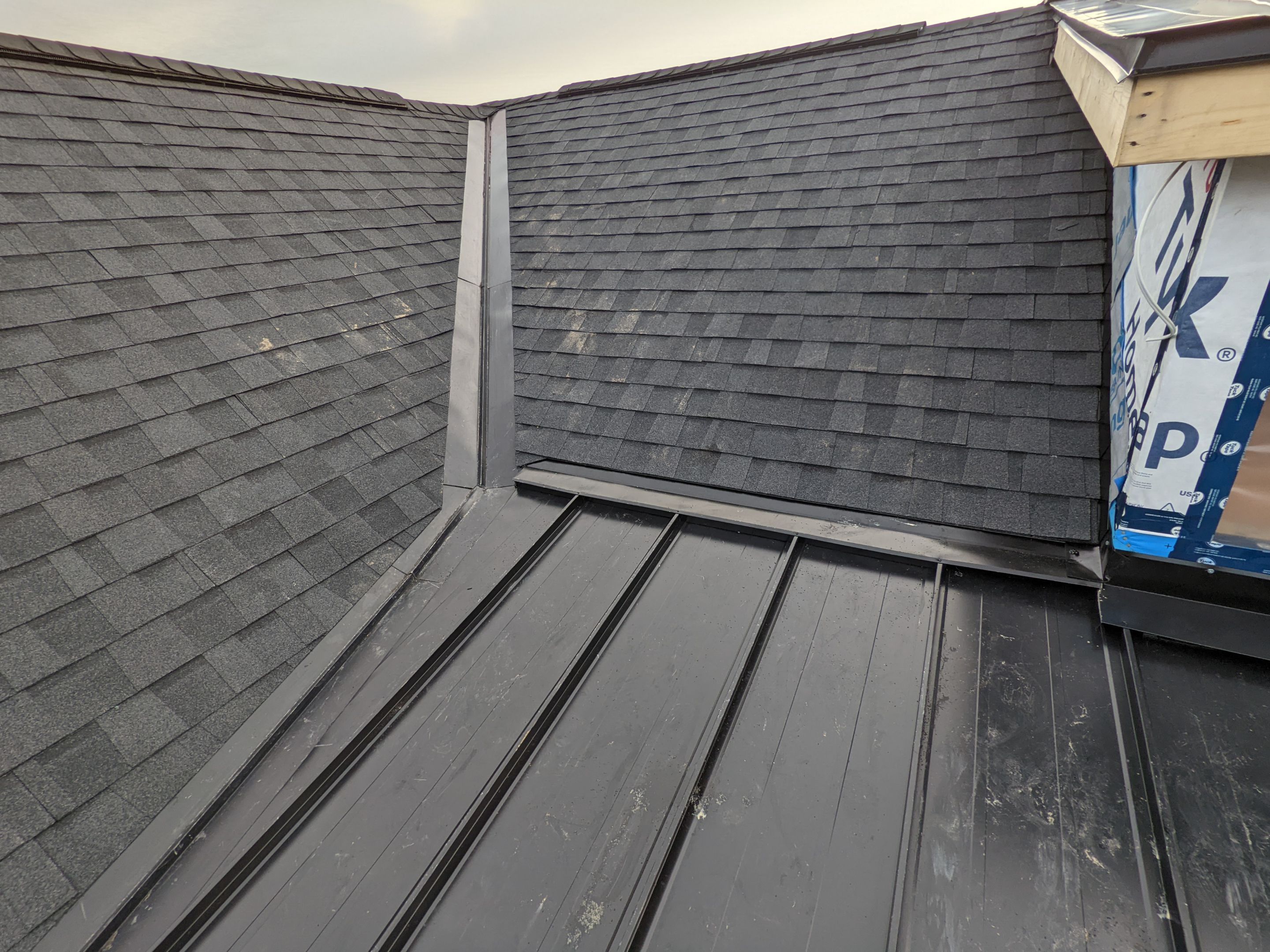 New Home Construction using 16" Standing Seam Panels, & Shingles  by Jay Carter Roofing & Sheet Metal