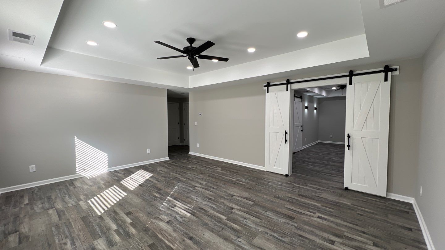 Modern Basement Finishing Project in Acworth Featuring Custom Wet Bar by Swift Home Renovations