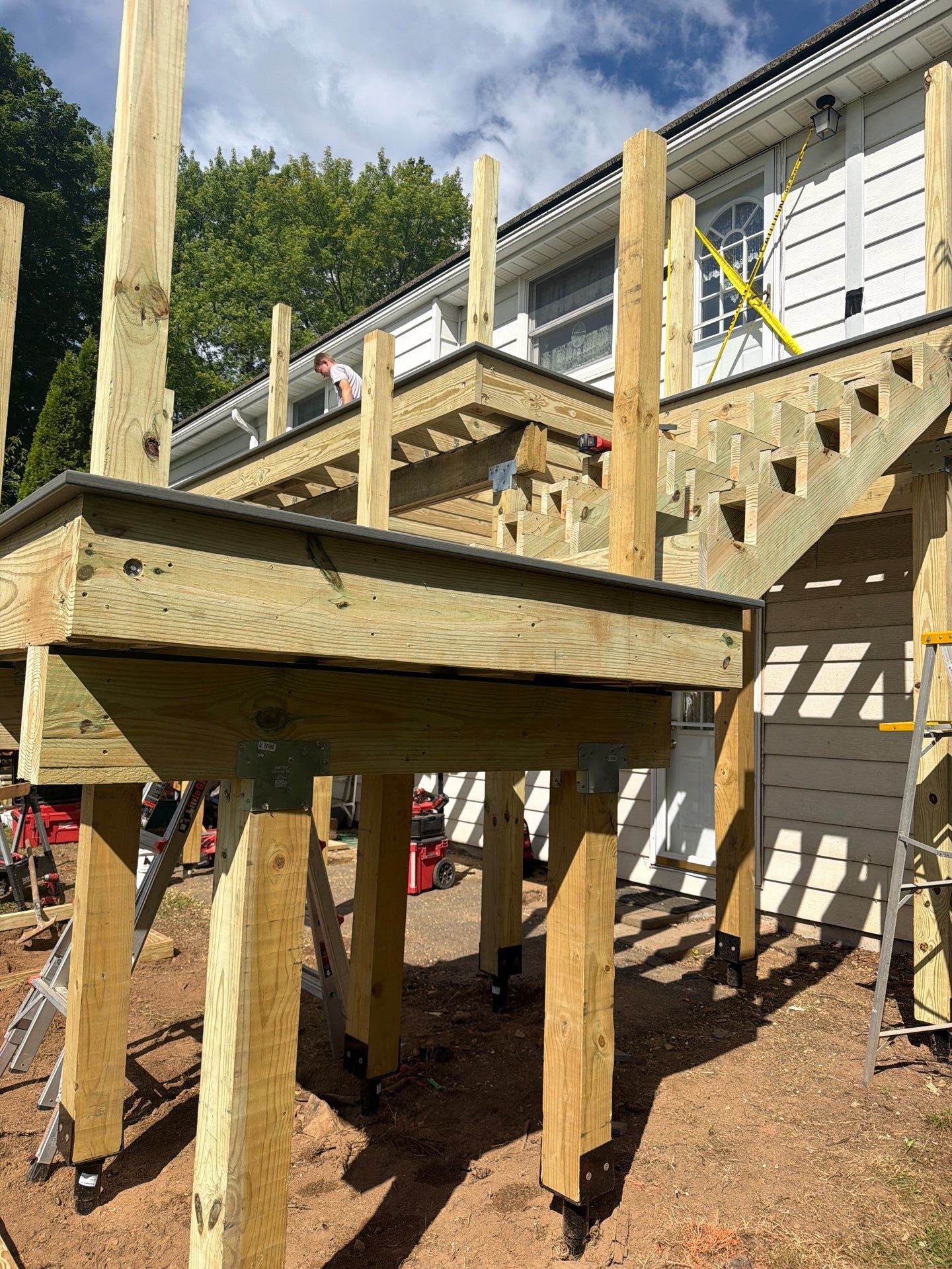 Deck Replacement using Trex tropical Island mist and transcend white railing.  by DiGiorgi Roofing and Siding Inc