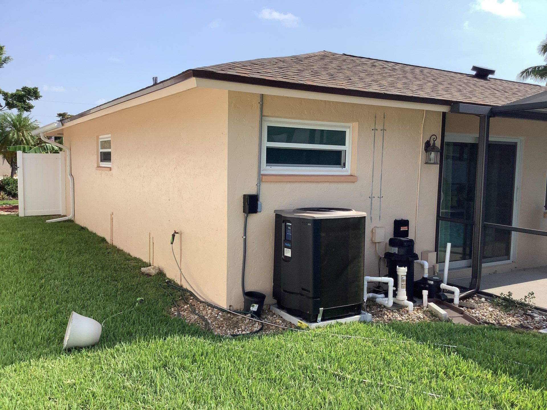 White K Style Seamless Gutters using 3X4 Elbow Downspout in Cape Coral FL by Gutter Professors