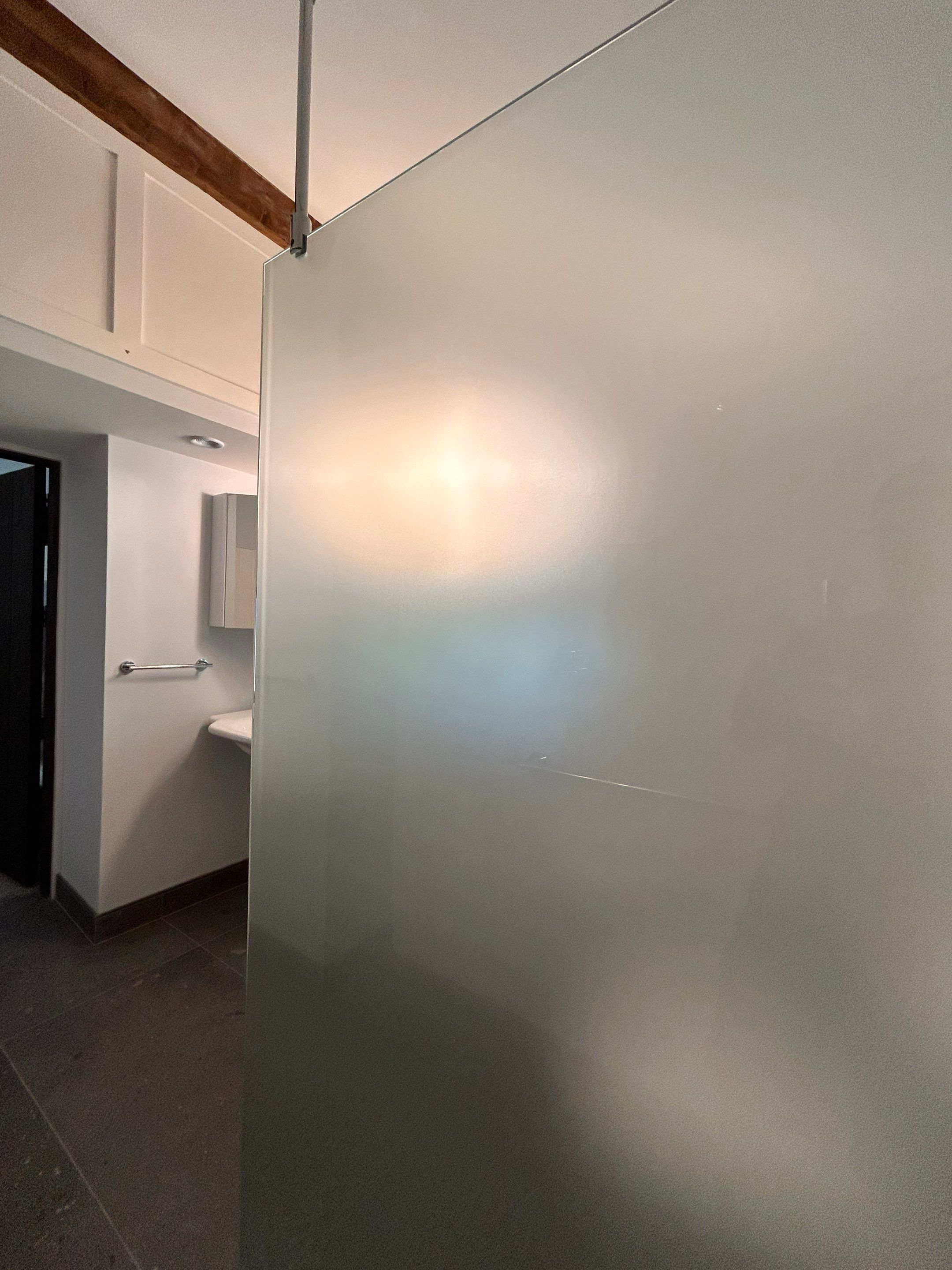Spray Panel using Acid Etched (Frosted) Tempered Shower Glass by Cheshire Glass Company