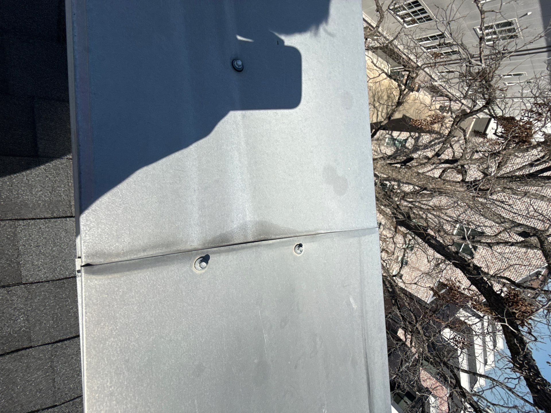 Residential Roof Replacement using TAMKO -  Stormfighter IR - Rustic Black by Action Exteriors Austin