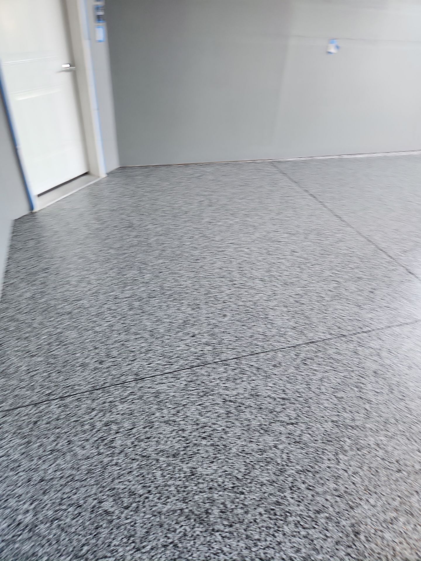 Garage Transformation using Domino by Croc Coatings, LLC