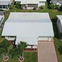 24ga 1.5" Mechanical Seam Regal White  by Total Roofing System The Metal Roof Experts