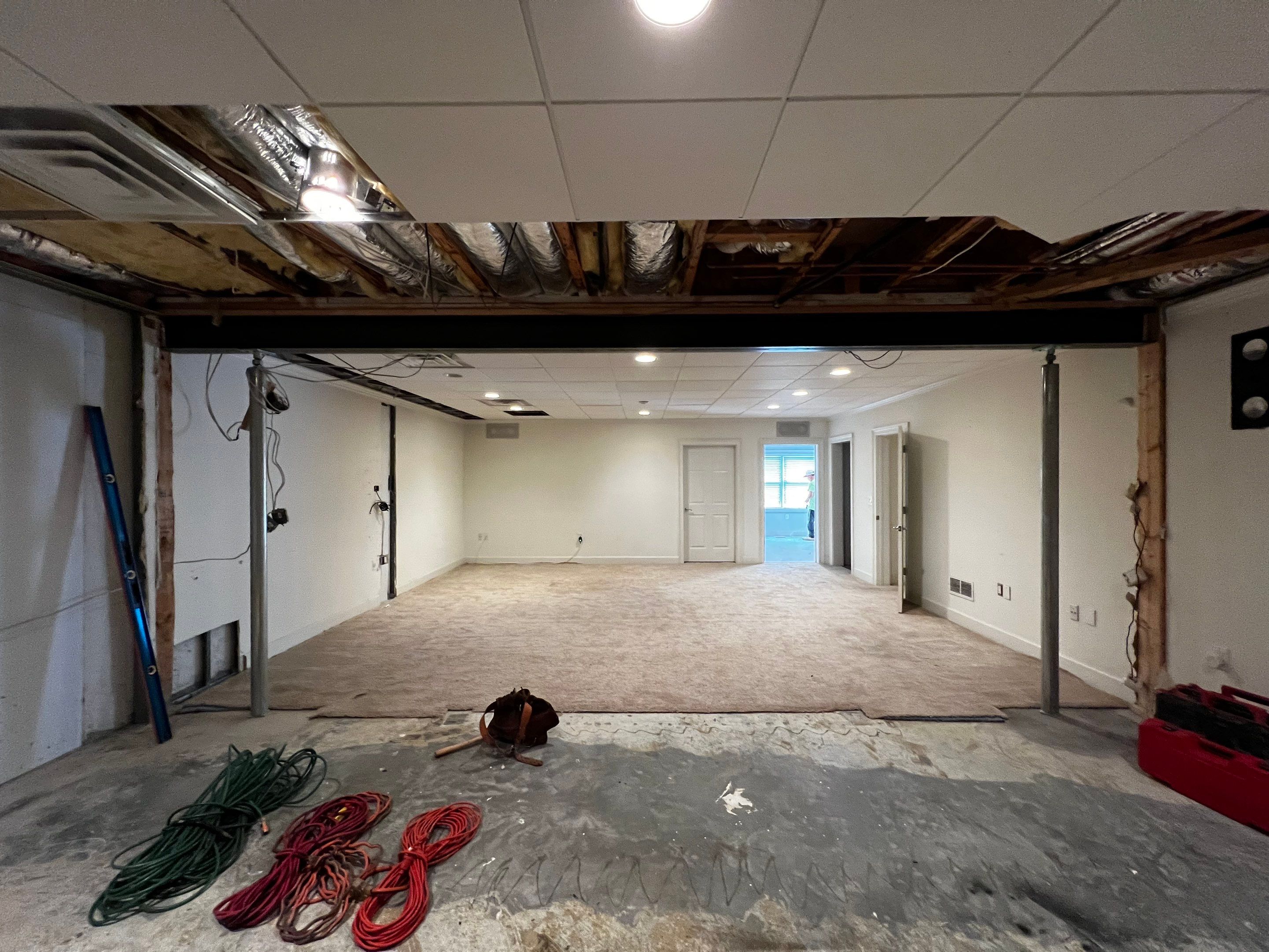 Finished Basement Renovation Featuring Home Theater and Custom Wine Cellar by Swift Home Renovations