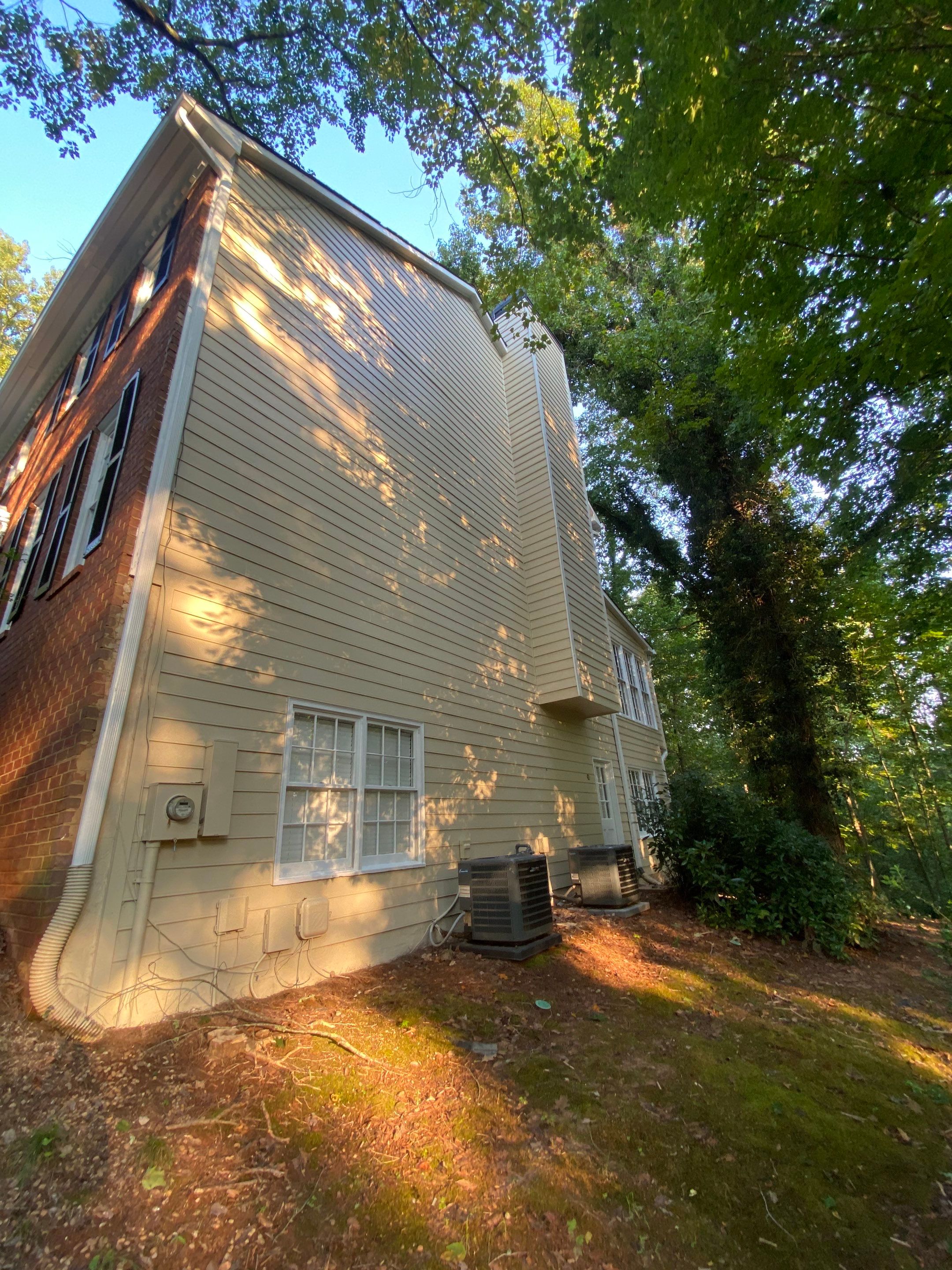 Two-Story Exterior House Painting and Siding Refresh in Alpharetta by Swift Home Renovations
