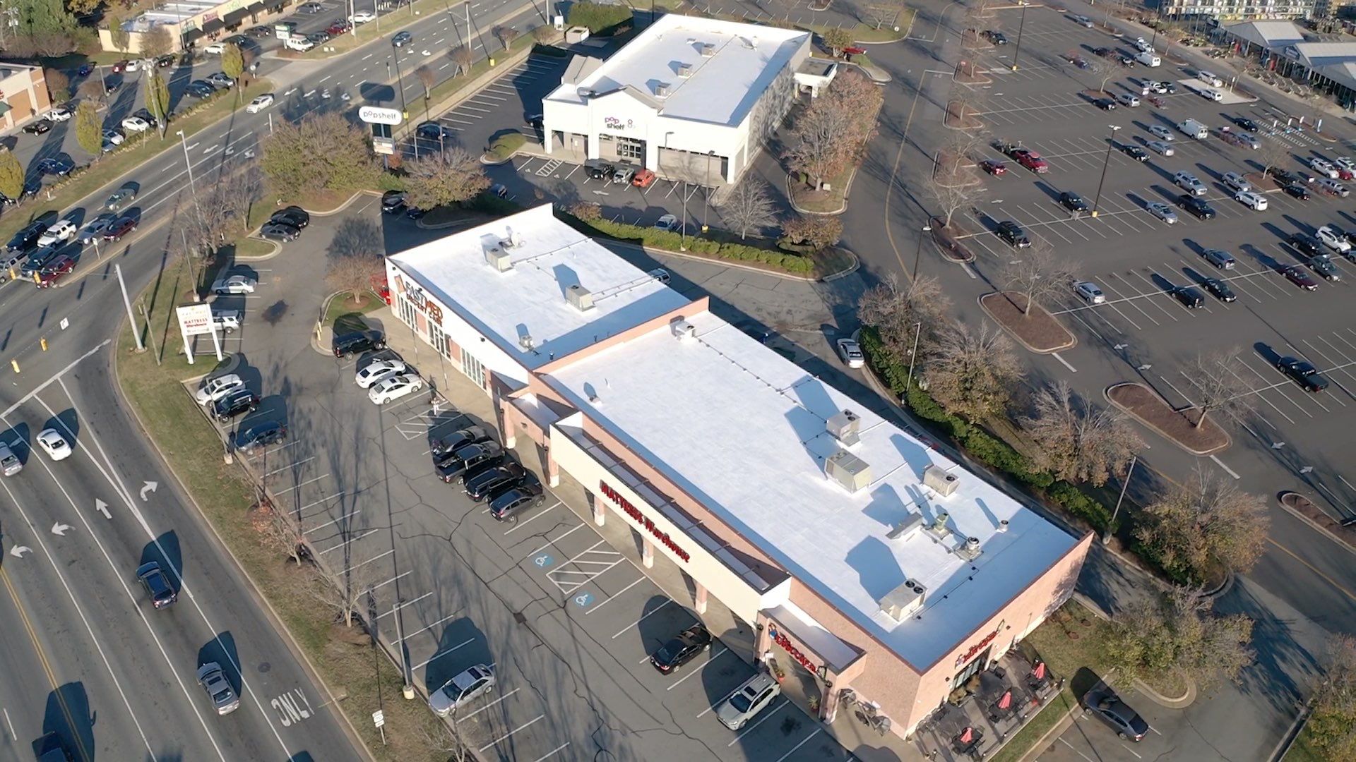 Commercial Coating using Poly Urerthane and Silicone Coating by Just In Time Roofing and Restoration