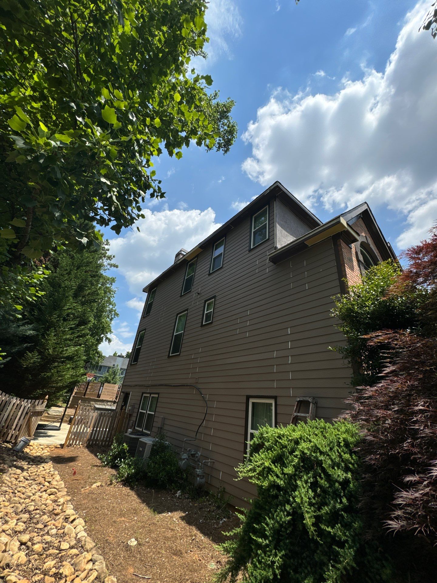 Full Exterior Painting and Gutter Replacement for Powder Springs Home by Swift Home Renovations