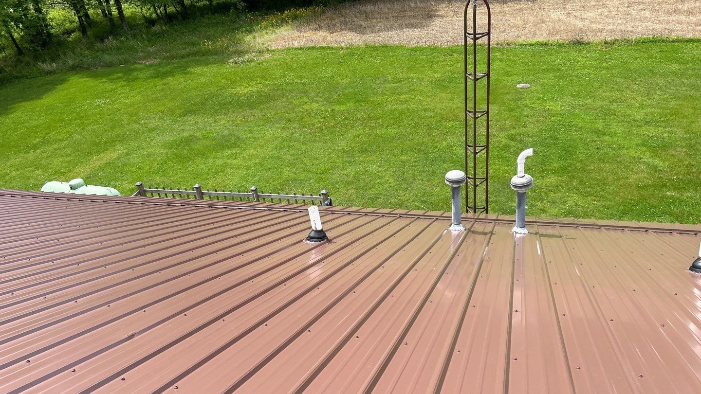 Residential Roofing Installation using Performance Panel Metal - Coca Brown by RoofX 