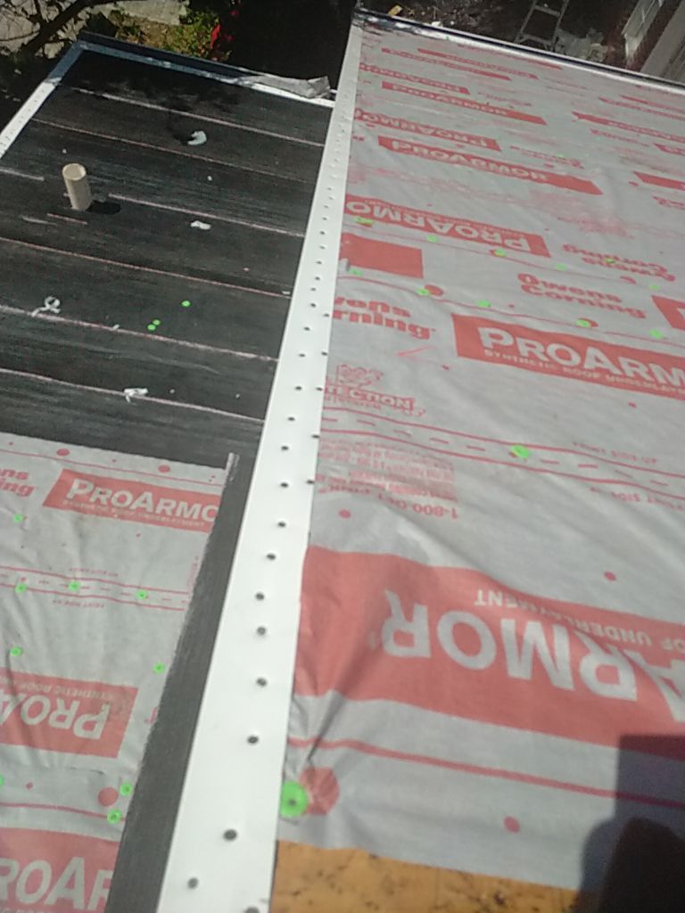 Residential Roofing Installation using Roof Replacement by American Roofing & Construction LLC