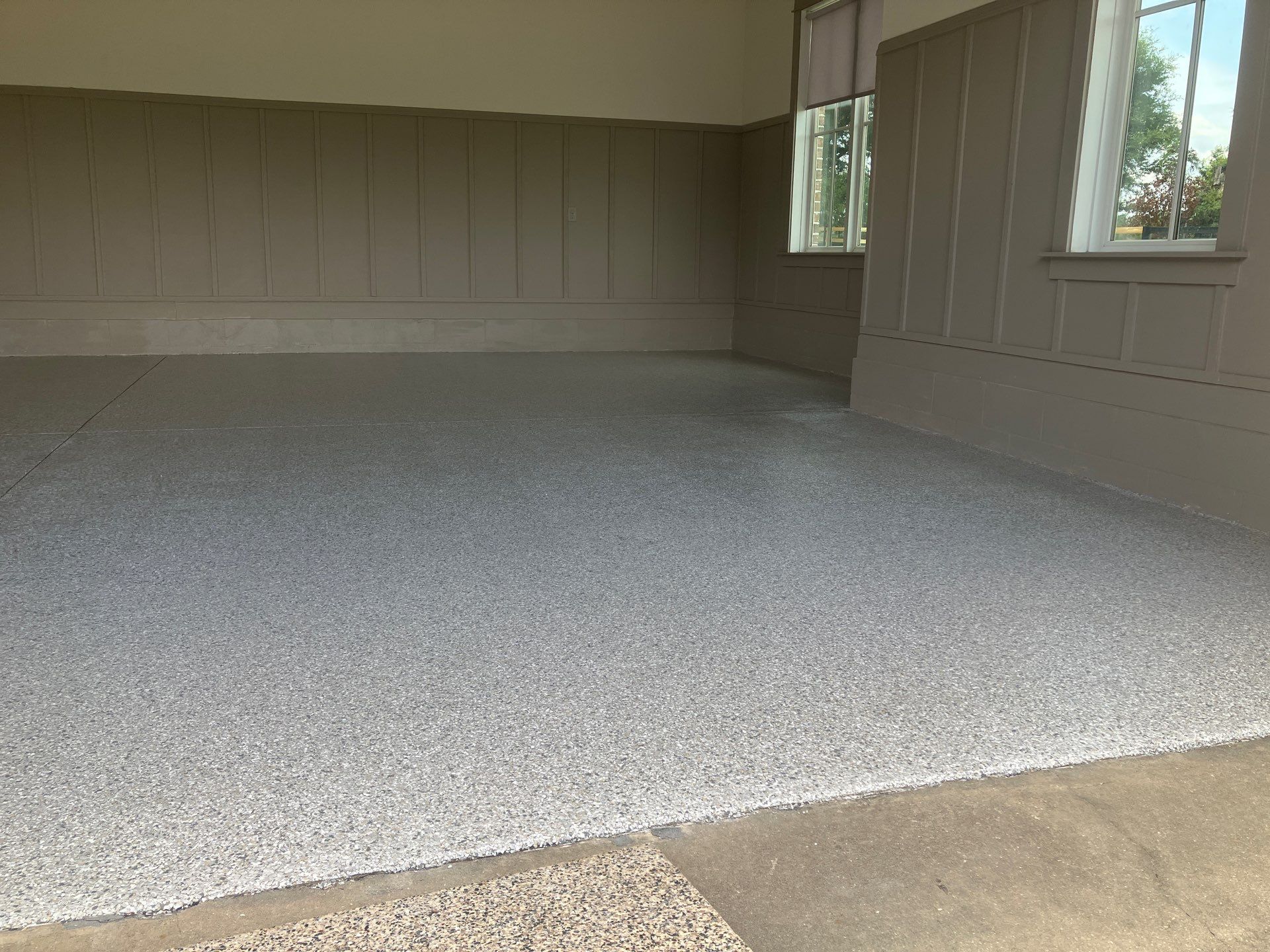 Garage in Mount Everest by Cross Creek Concrete Coatings