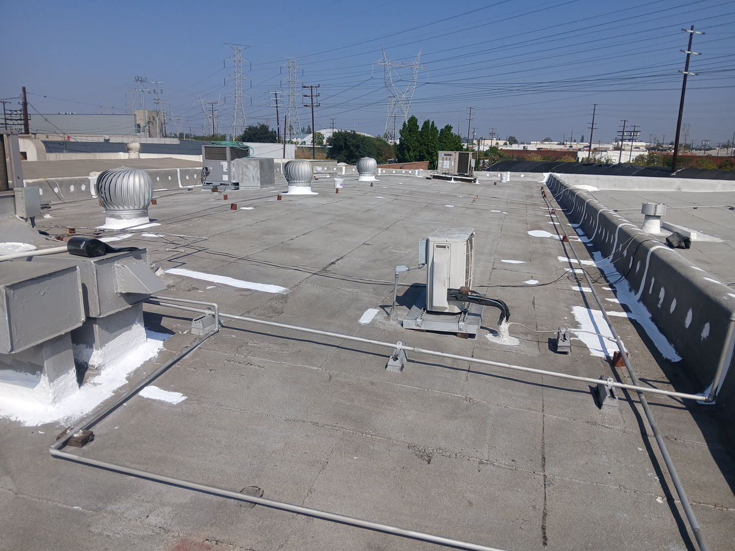 Silicone Application Project on a Commercial Property by Hull Brothers Roofing