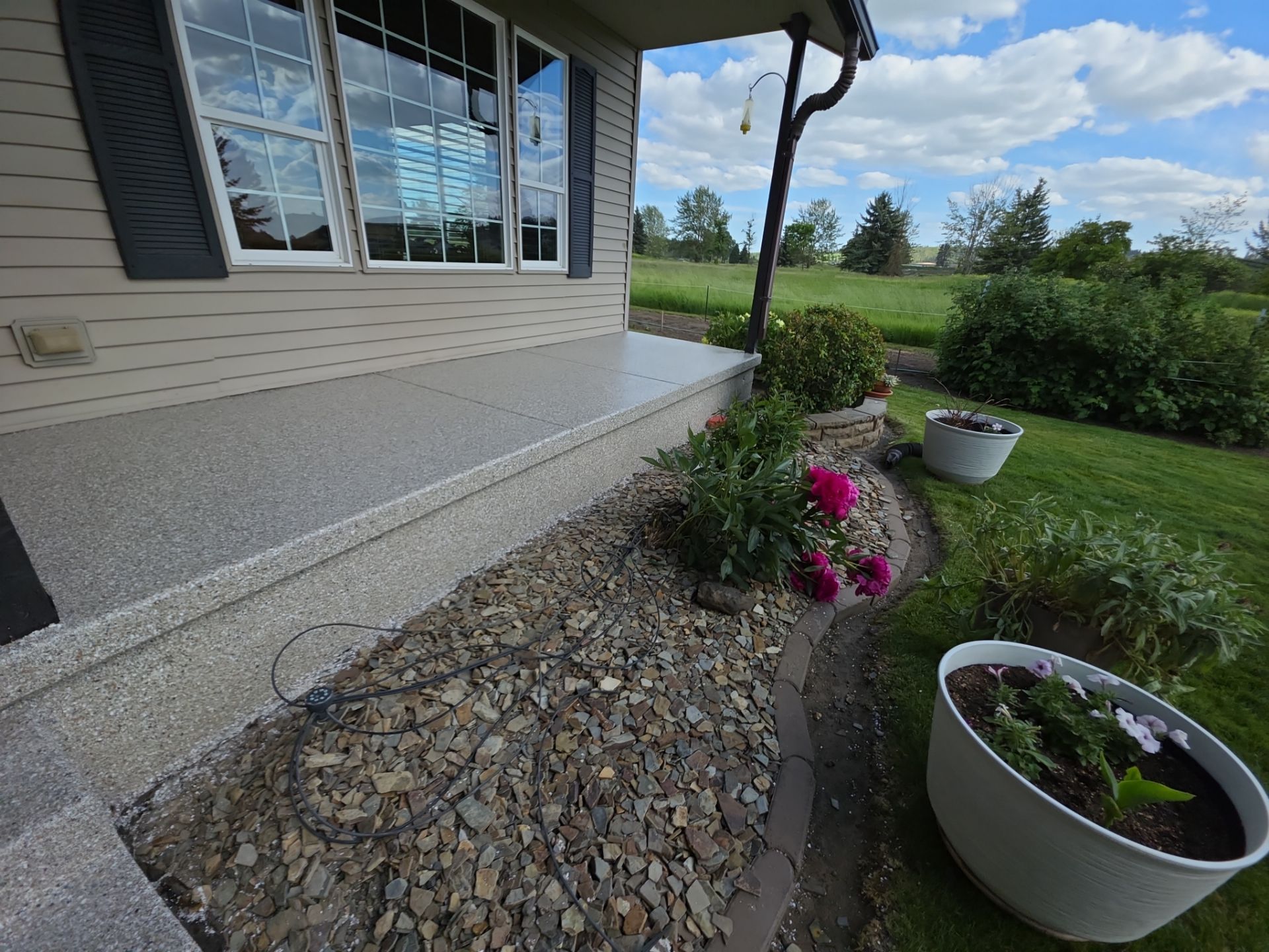 Concrete Patio and Walkway Coating Transformation in Cheney by Croc Coatings, LLC