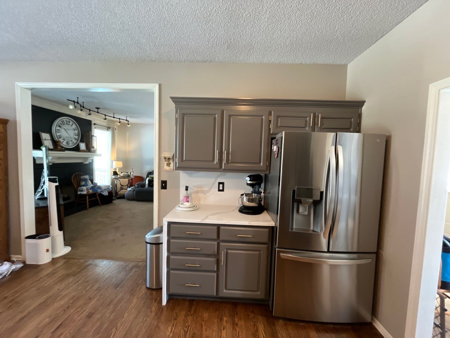 Cabinet Refresh – From Classic White to Modern Gray by Cougar Painting