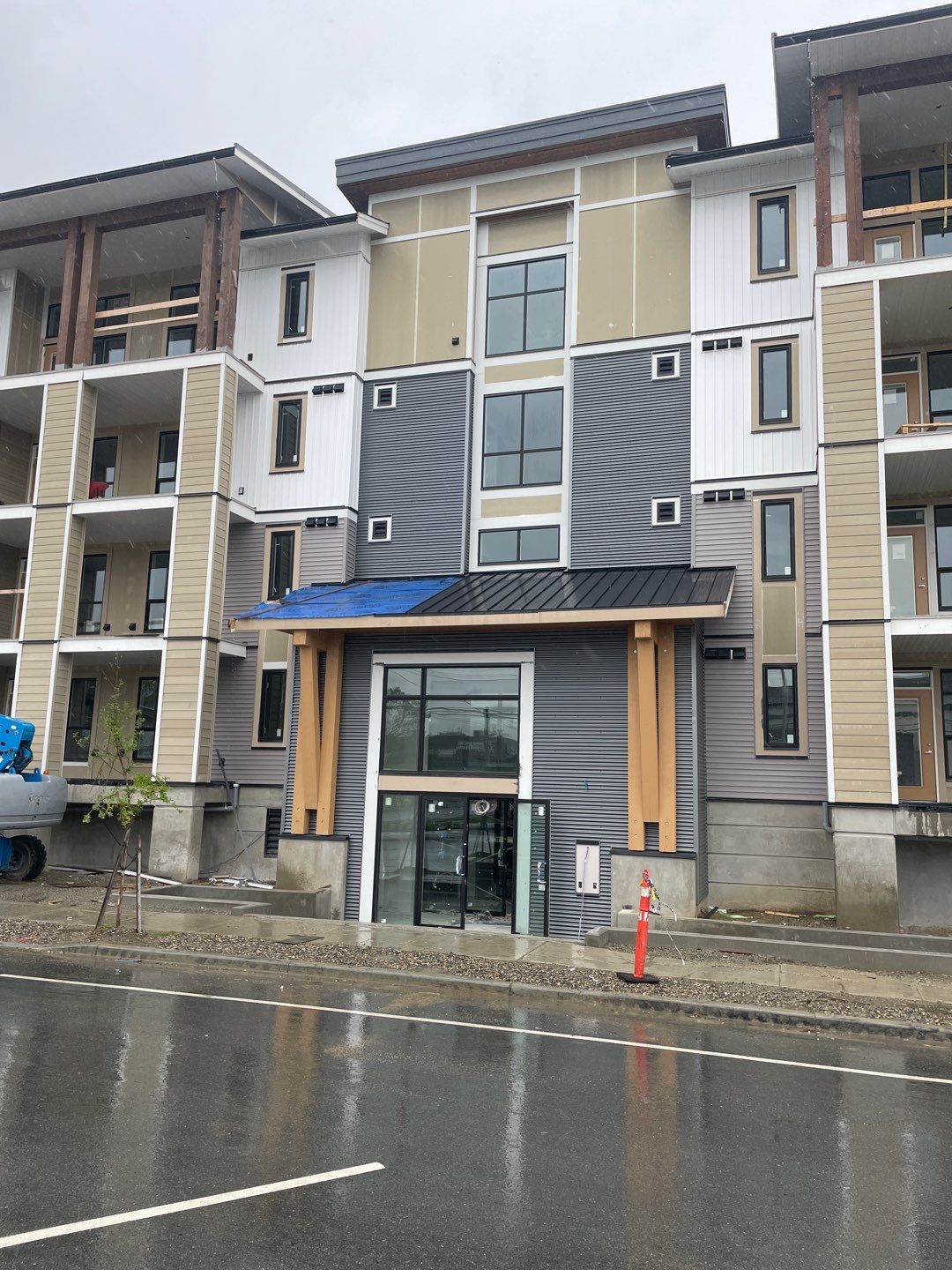 Large apartment with sbs, shingles and prolok metal  by Top Notch Roofing Inc