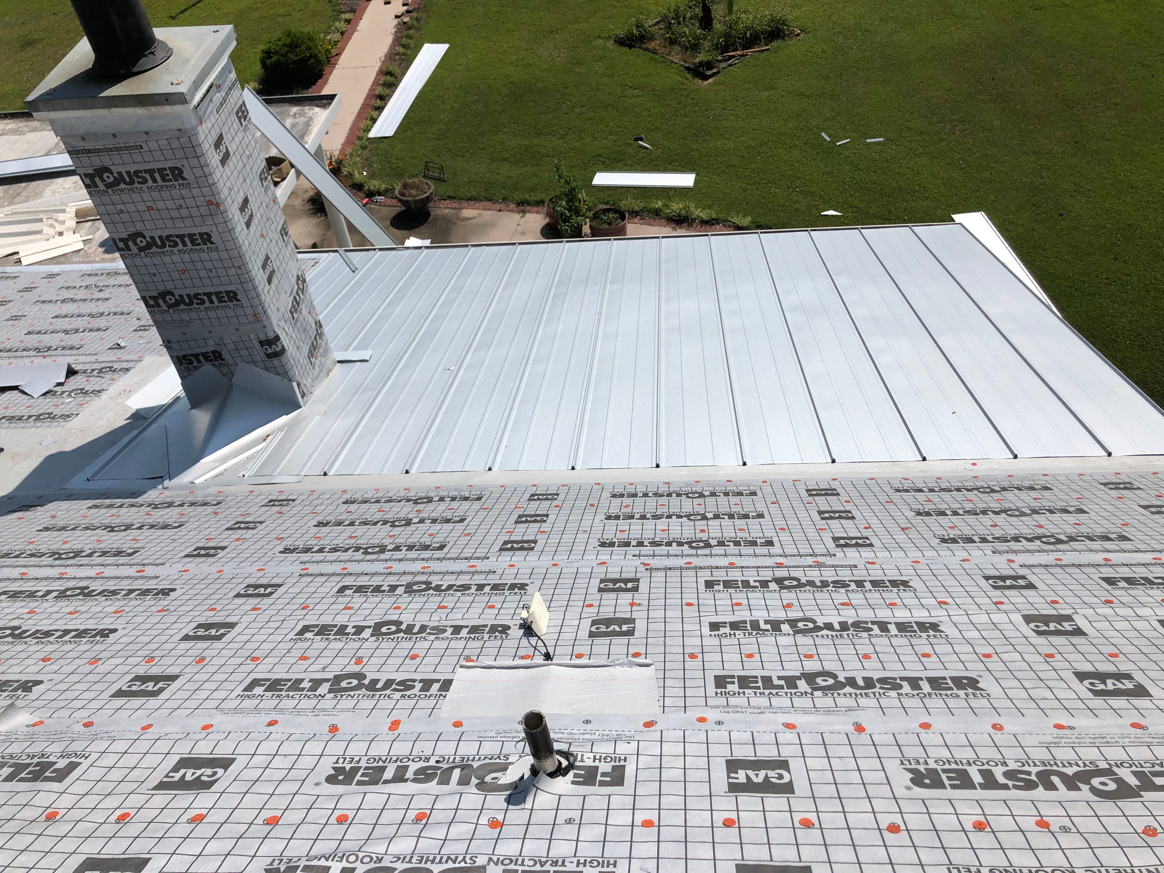 Residential Roofing Installation using Metal roofing by American Roofing & Construction LLC