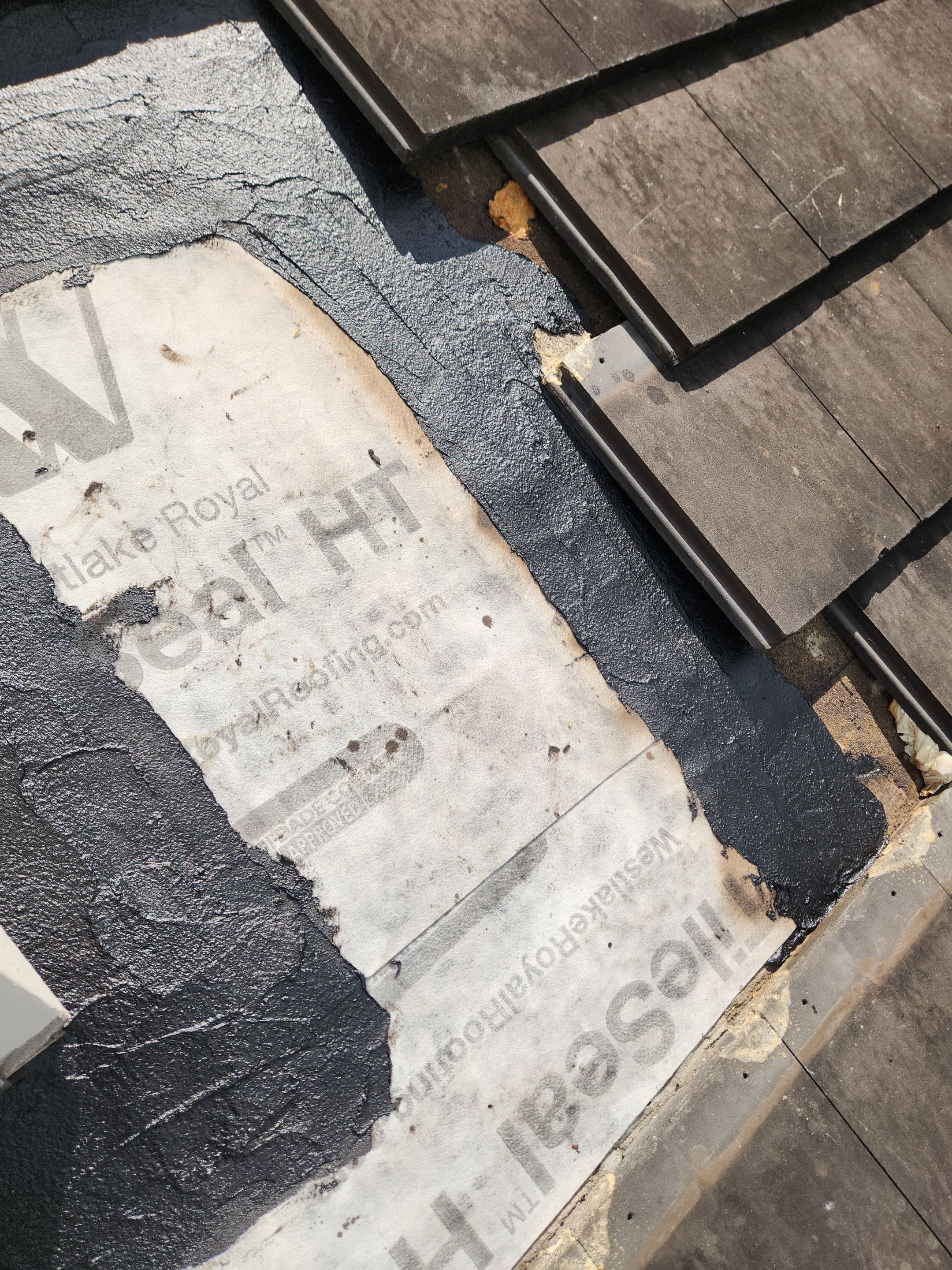 Silicone roof coating and tile tune up in Boca Raton by Aastro Roofing