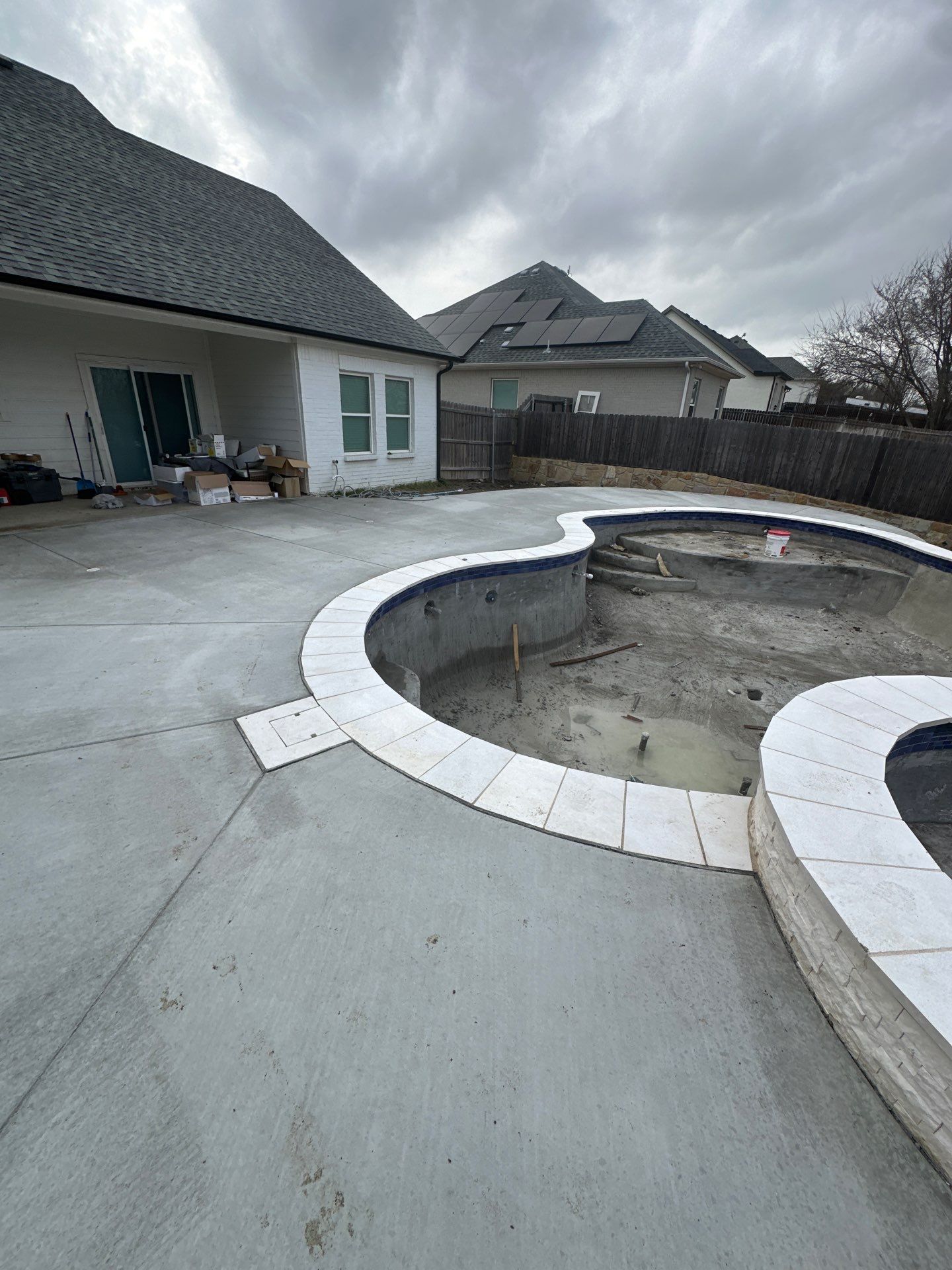 Freeform Pool with Raised Spa and Water Feature by Pinnacle Pools and Spas - DFW